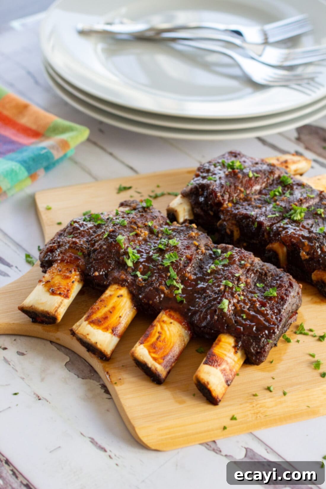Fall-Off-The-Bone Beef Ribs 7 Beef Ribs on a wood board