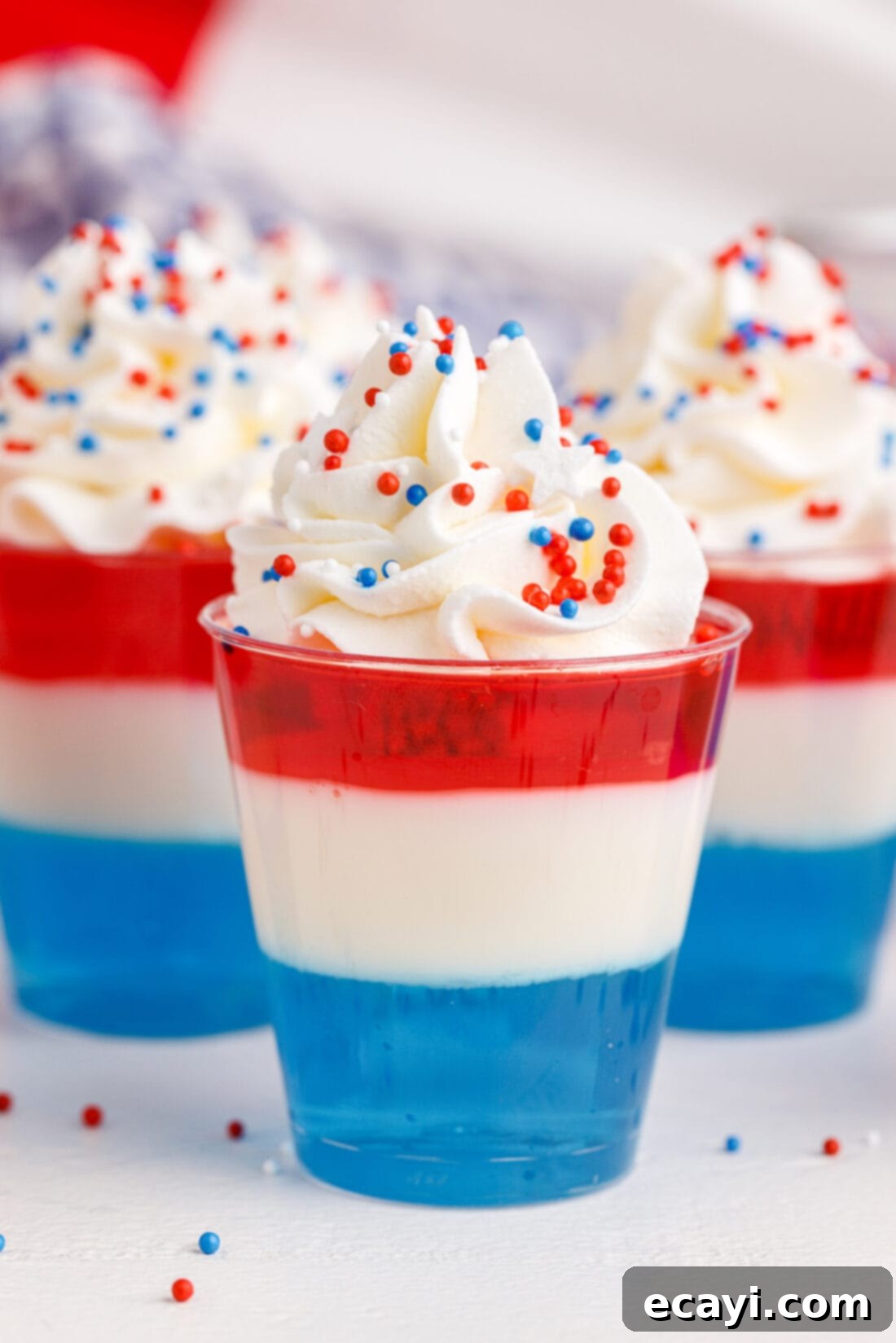 Star-Spangled Gelatin Shots 2 4th of July Jello Shots ith whipped cream