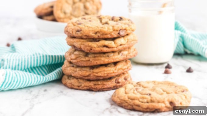 Big Soft Chocolate Chip Cookies AmandasCookin.com stack of cookies with glass of milk