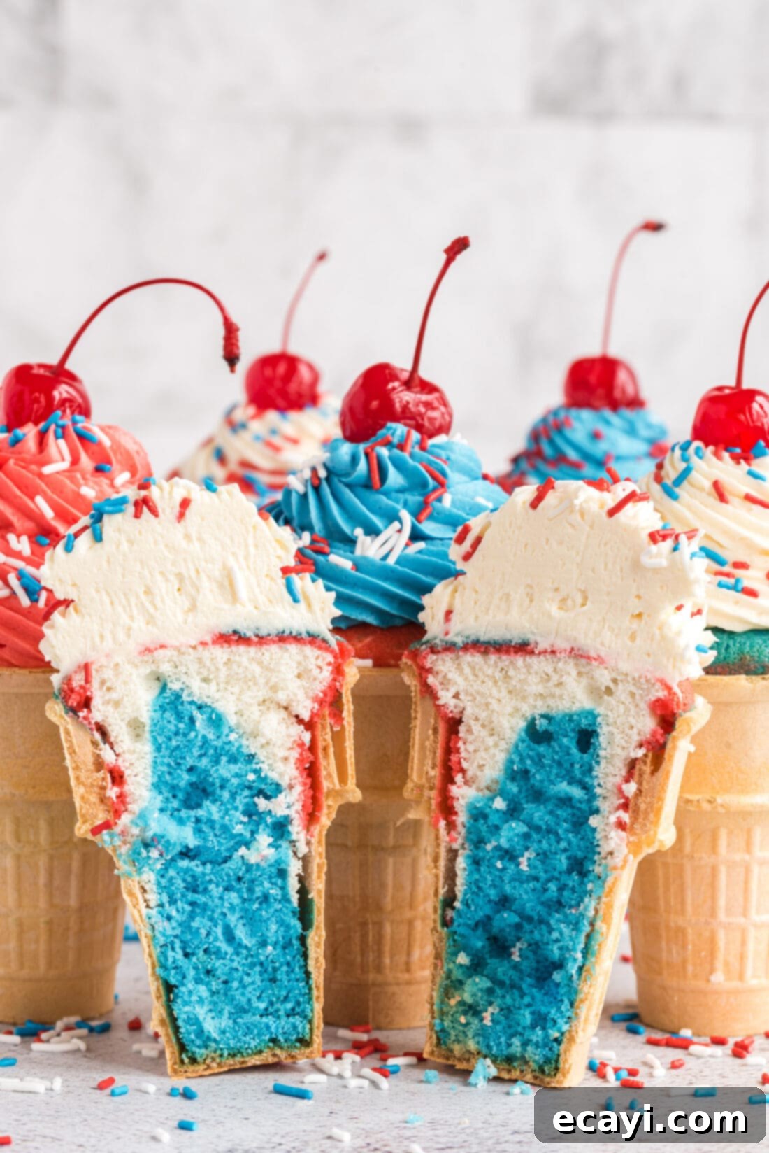 Patriotic Cone Cupcakes 14 Patriotic Ice Cream Cone Cupcakes sliced in half, showing internal cake layers