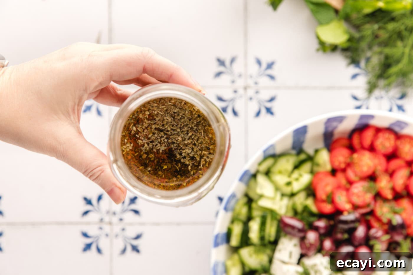 Authentic Greek Salad 6 lemon, olive oil, and red wine vinegar salad dressing in a jar