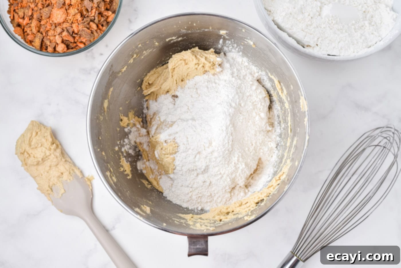 Golden Crunch Butterfinger Cookies 8 mixing flour into cookie dough