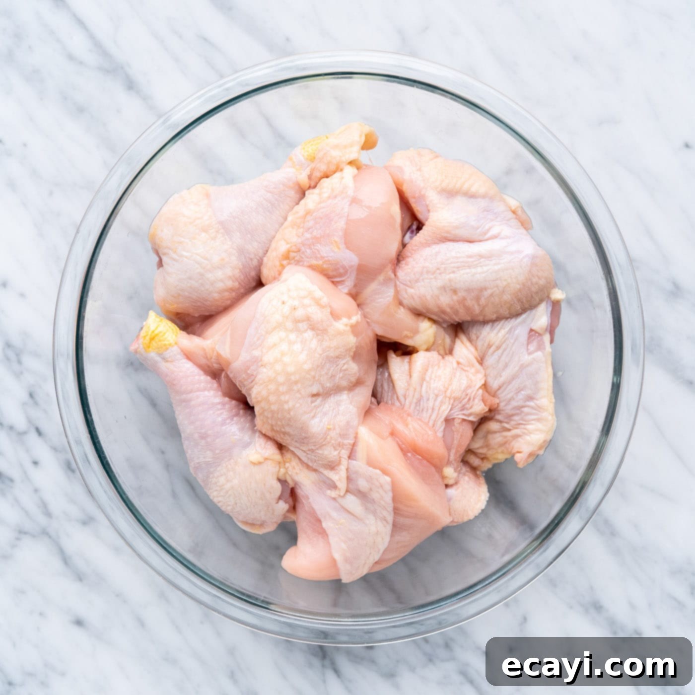 Crispy Air Fryer Chicken 5 whole cut chicken in a bowl