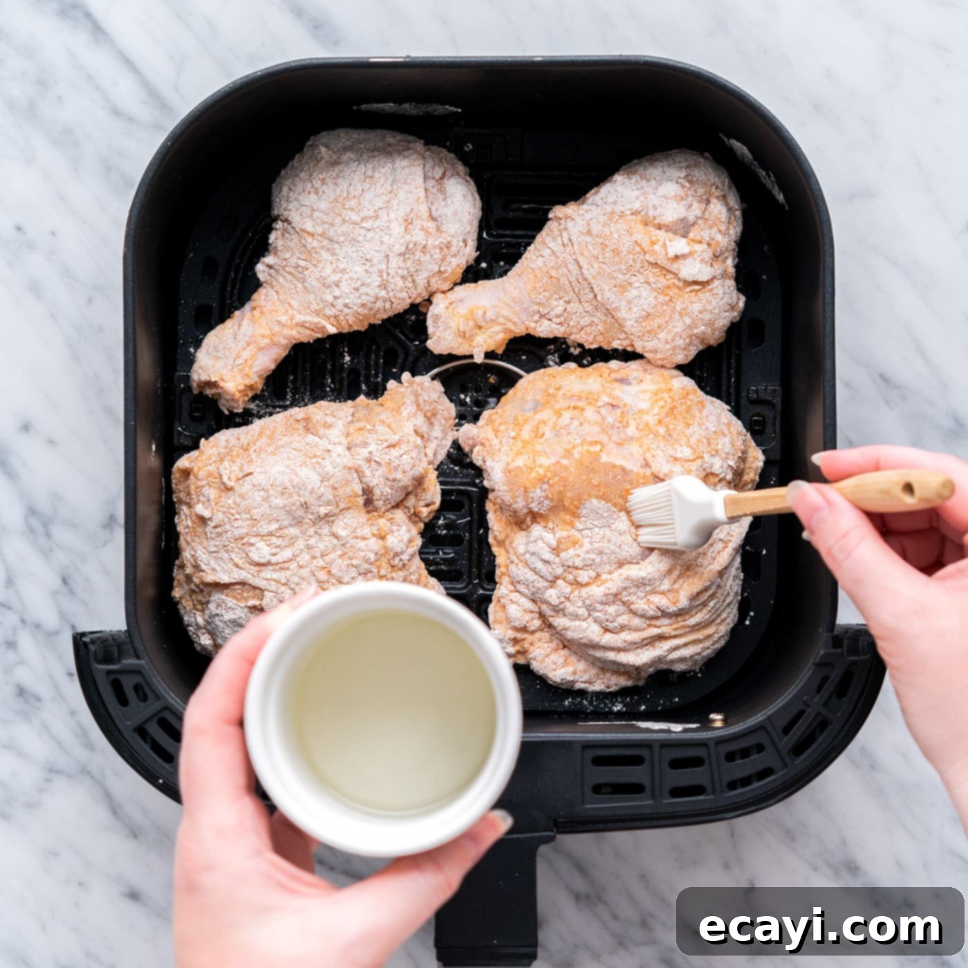 Crispy Air Fryer Chicken 10 brushing dredged chicken with oil