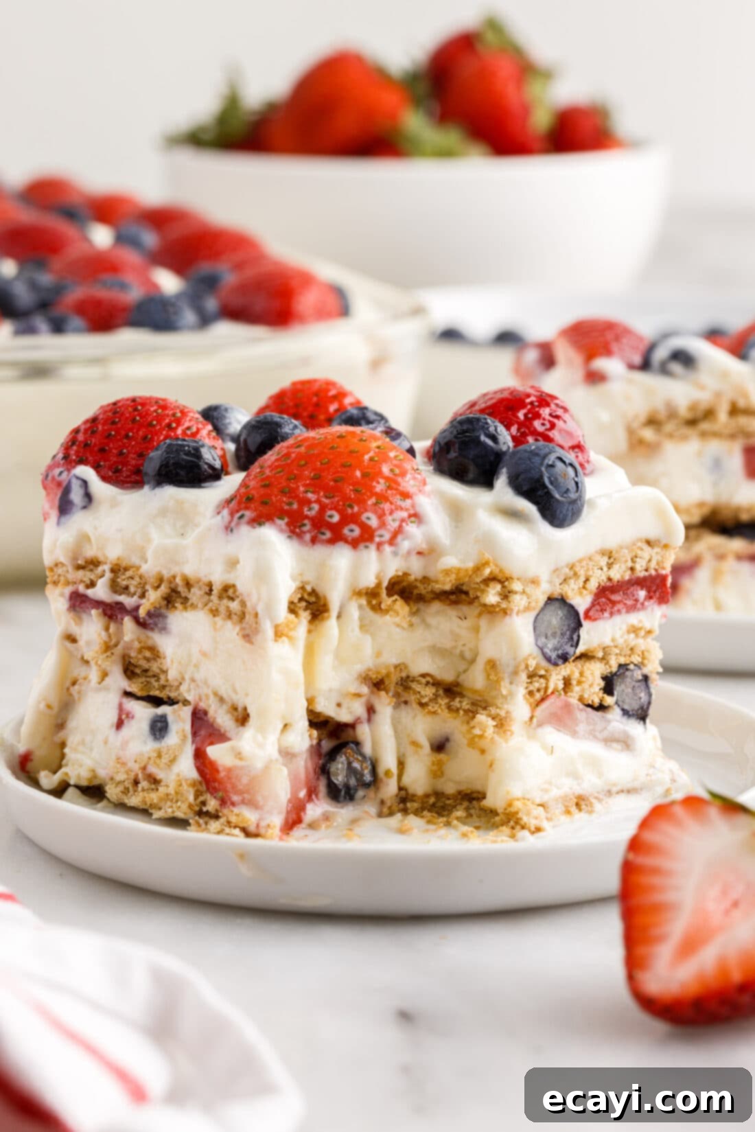 Berry Burst Chill Cake 2 slice of Mixed Berry Icebox Cake with a bite out of it