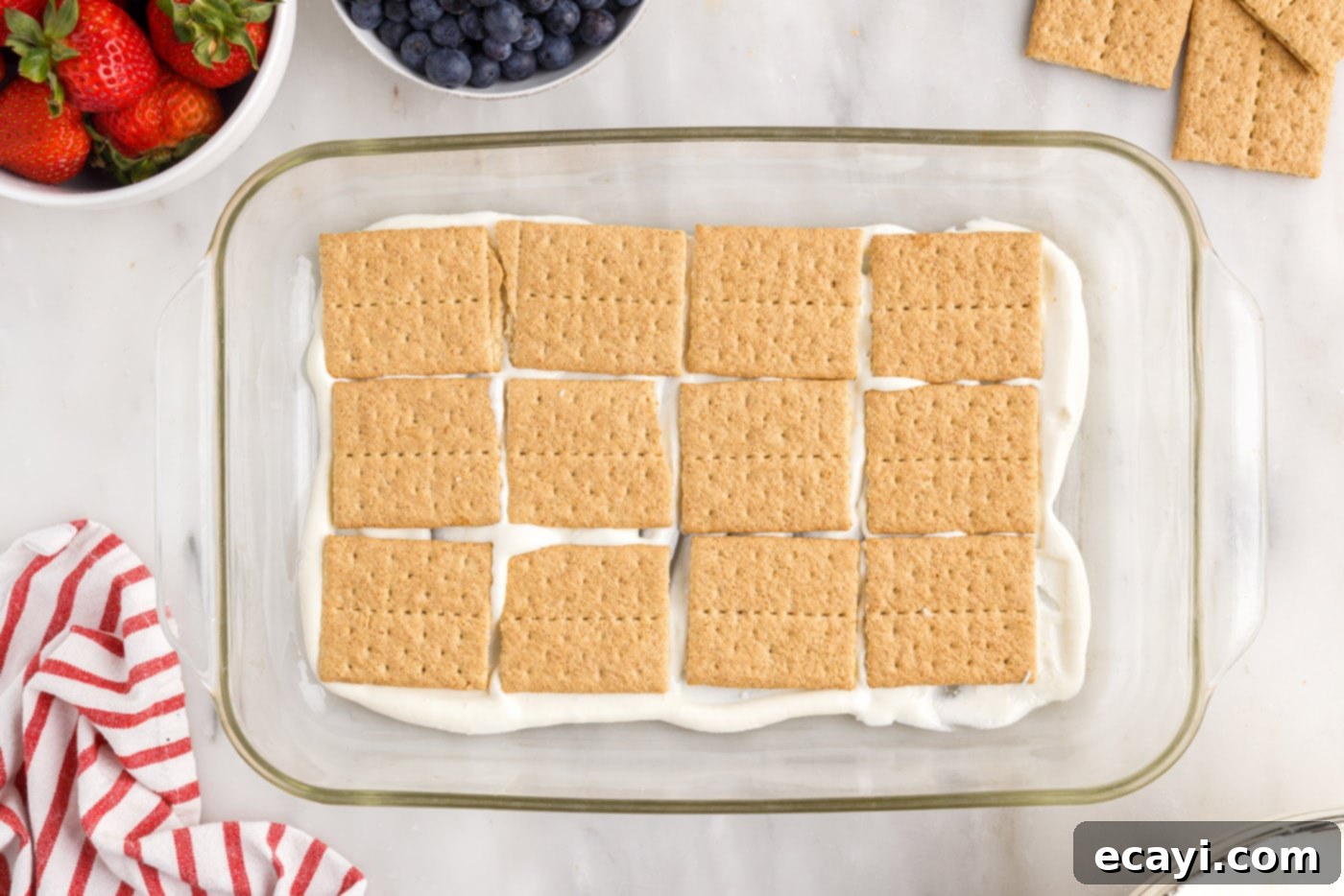 Berry Burst Chill Cake 11 graham crackers layered on top of cool whip pudding mixture