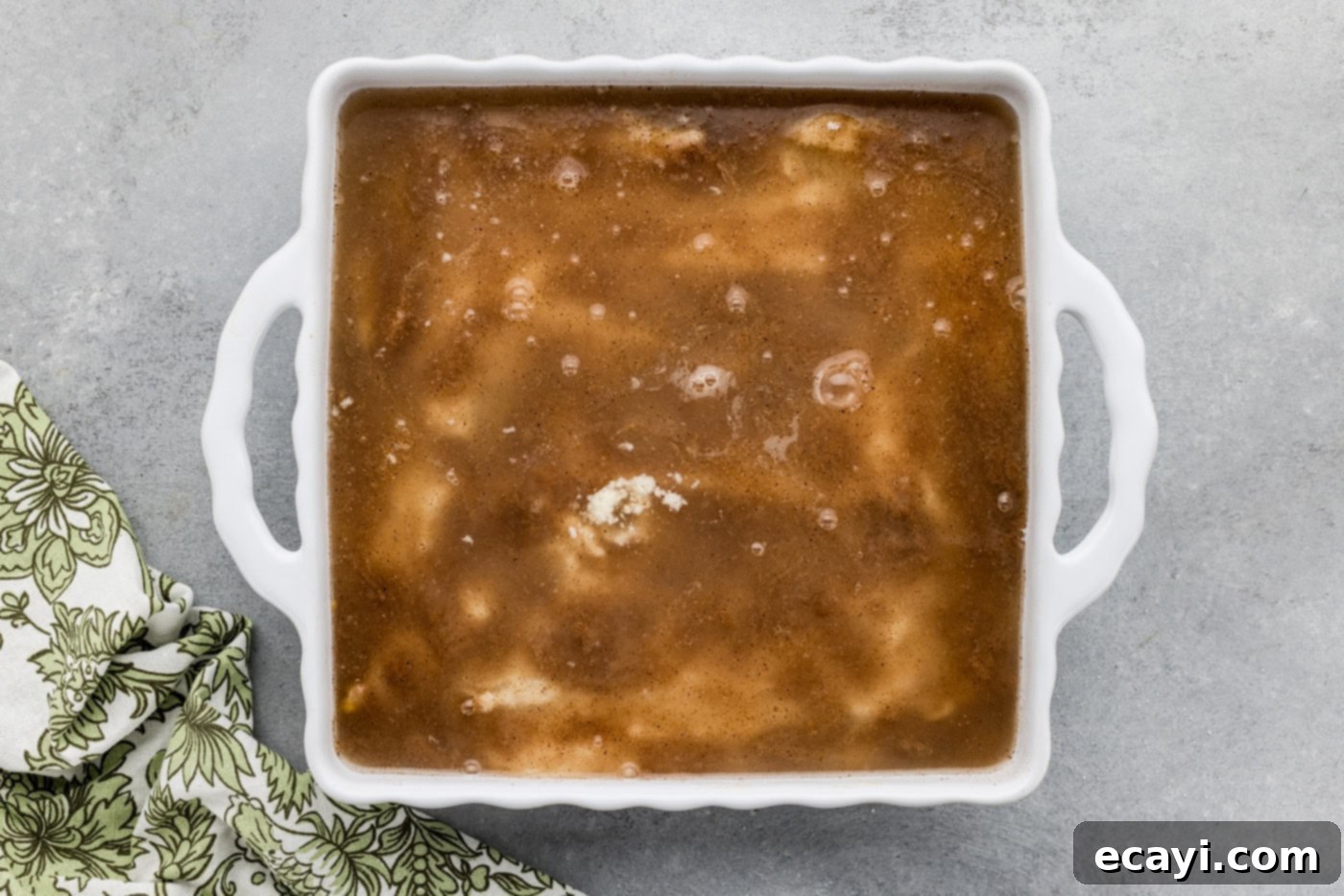 Golden Pear Peach Cobbler 12 overhead of pear peach cobbler mixture in a baking dish