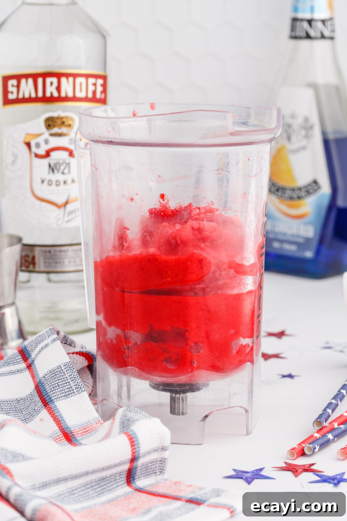 Red White & Boozy Freeze 6 The blended red layer of vodka raspberry slush is shown, with a thick and smooth consistency, ready for chilling.