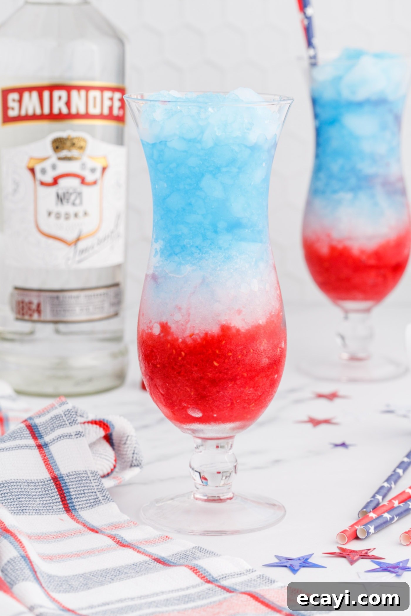 Red White & Boozy Freeze 10 A close-up shot of the finished layered drink, showcasing the distinct red, white, and blue layers in a tall glass.