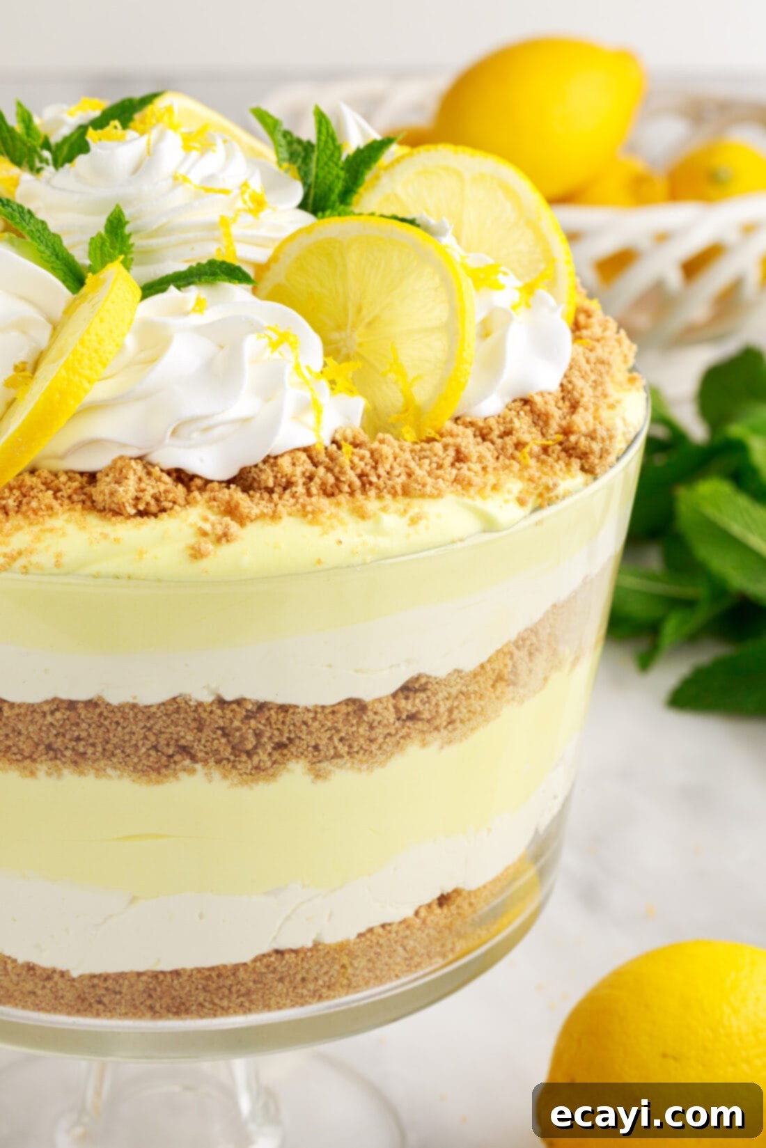 Golden Lemon Indulgence 3 Close-up of a spoonful of Lemon Lush Trifle, showcasing its beautiful layers.
