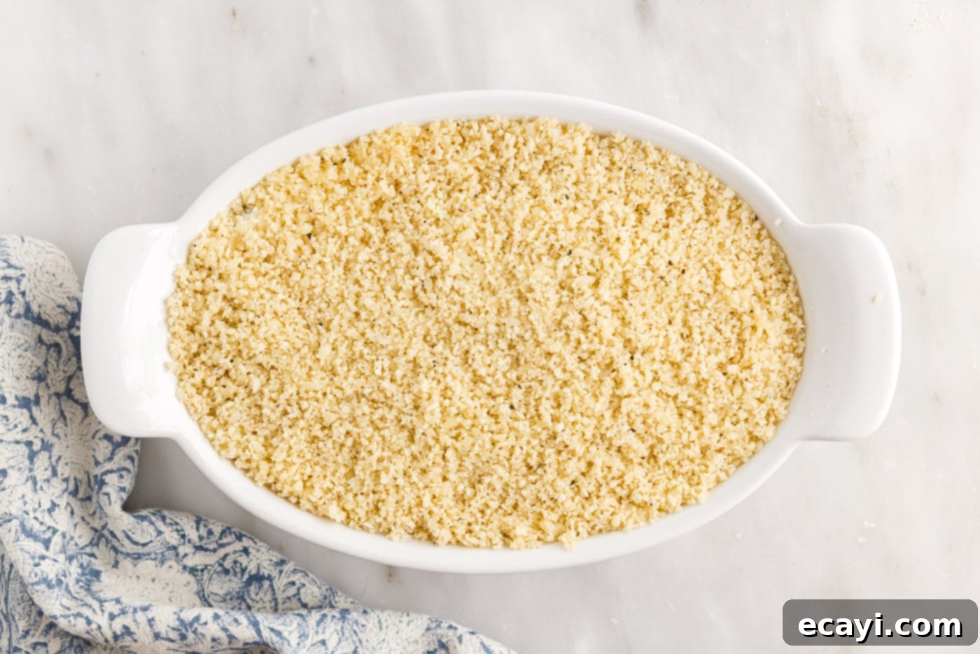 Zesty Jalapeno Delight Dip 9 breadcrumbs over jalapeno popper dip