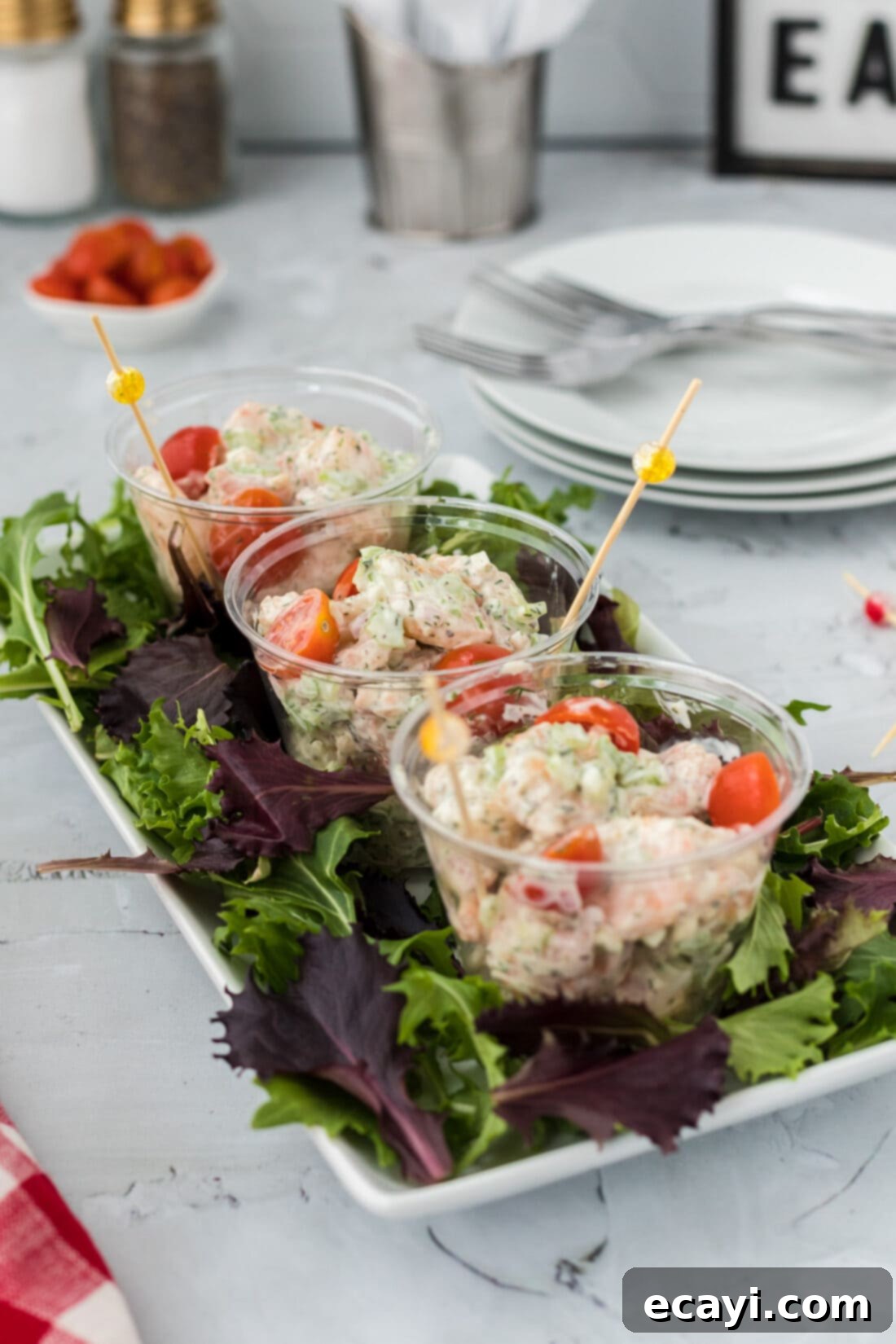 Zesty Shrimp Salad 3 Shrimp Salad in individual serving cups, garnished with fresh dill and ready to be served