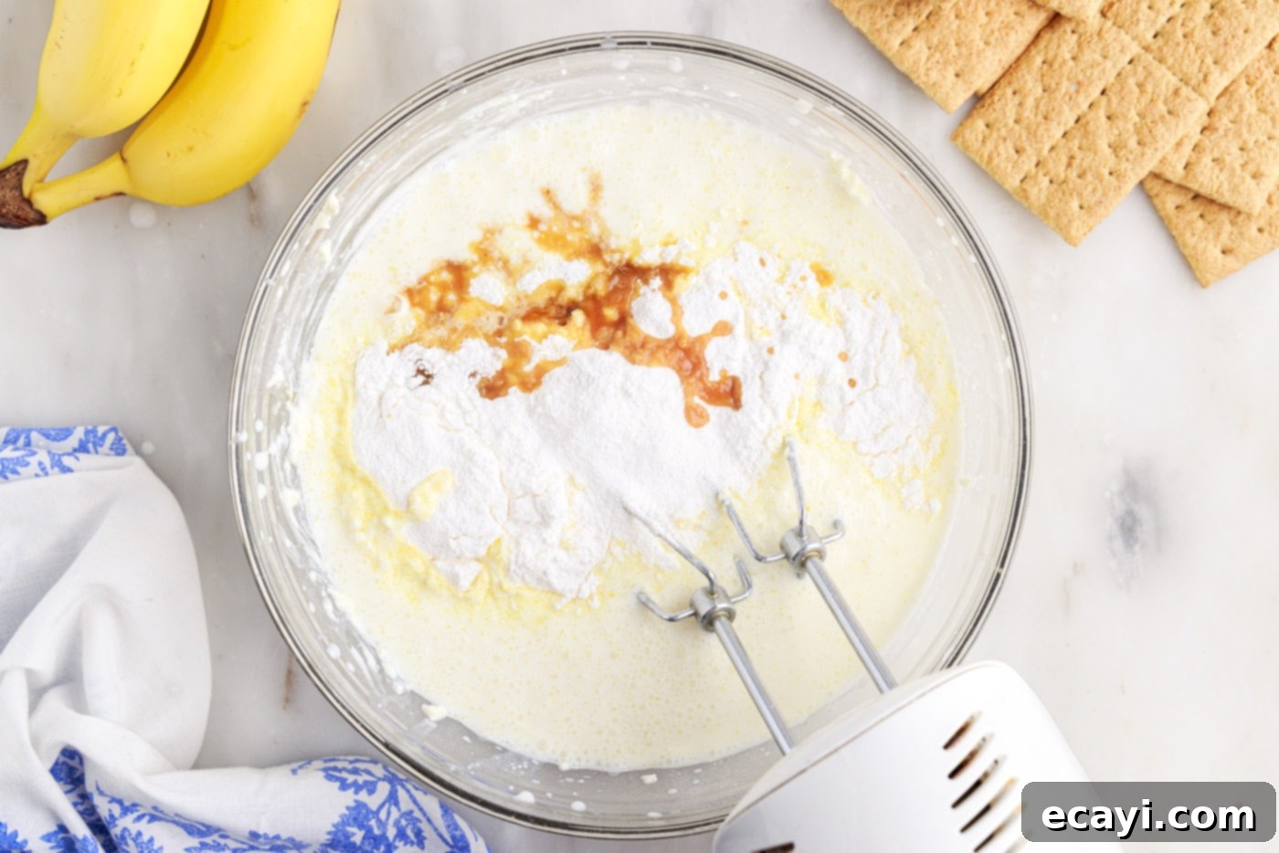 No-Bake Banana Cream Delight 6 mixing banana pudding mix and vanilla into cream cheese mixture