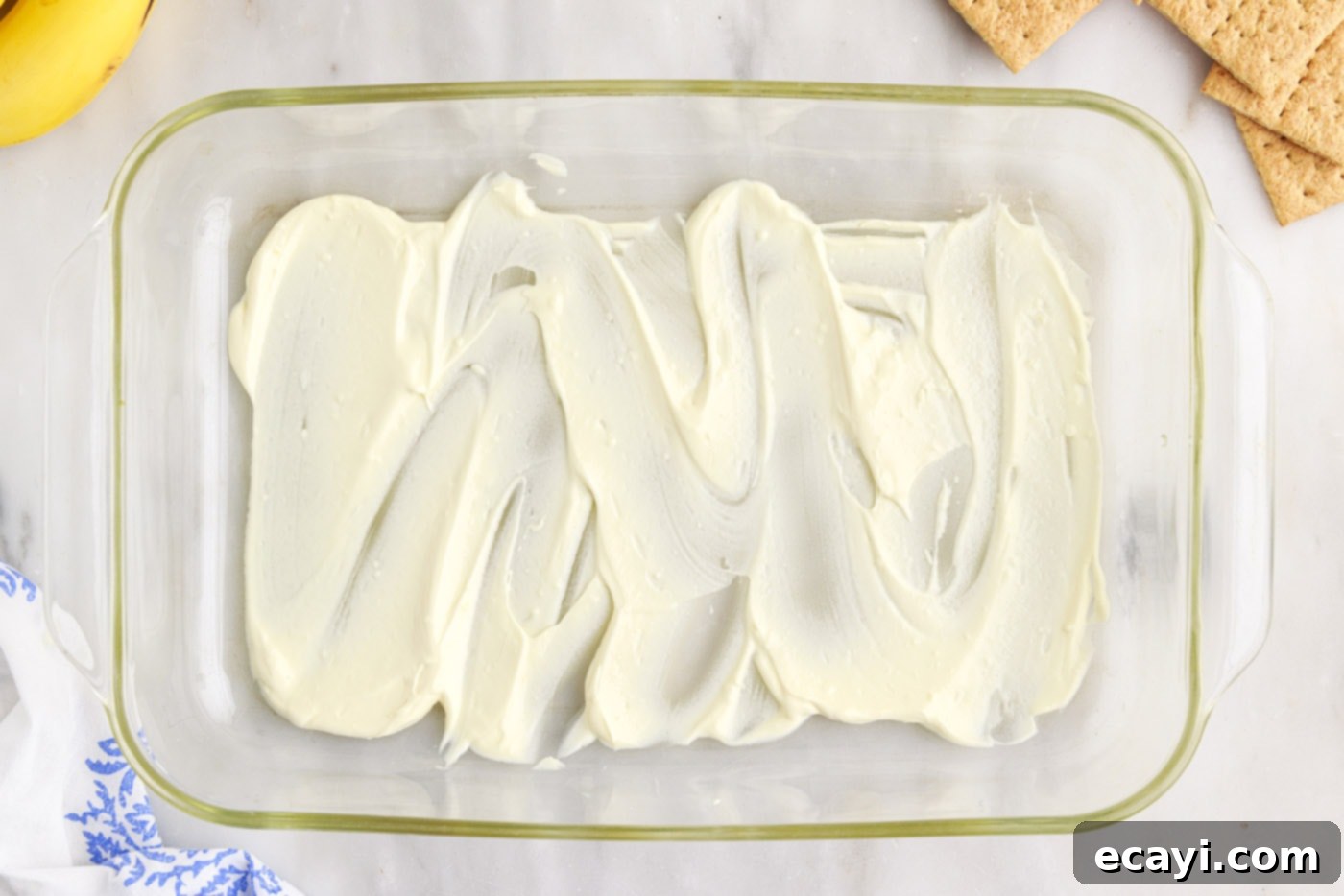 No-Bake Banana Cream Delight 9 layer of pudding mixture on bottom of a casserole dish