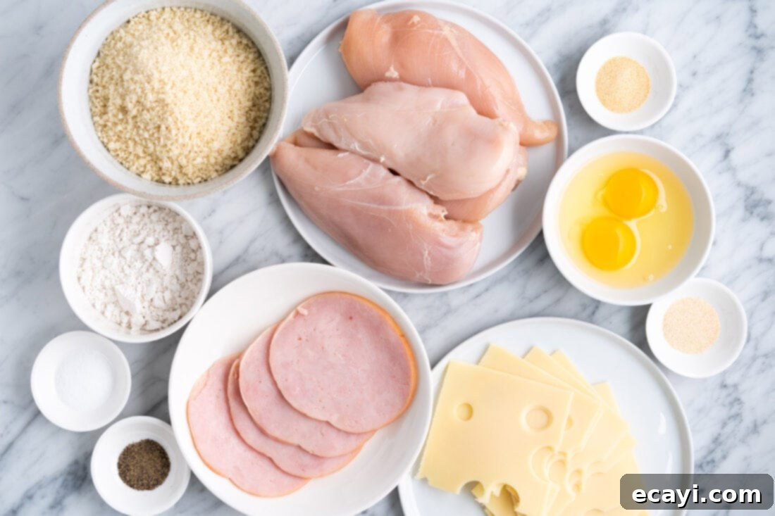 Crispy Air Fryer Chicken Cordon Bleu 4 Fresh ingredients for Air Fryer Chicken Cordon Bleu including chicken, ham, swiss cheese, breadcrumbs, flour, and eggs