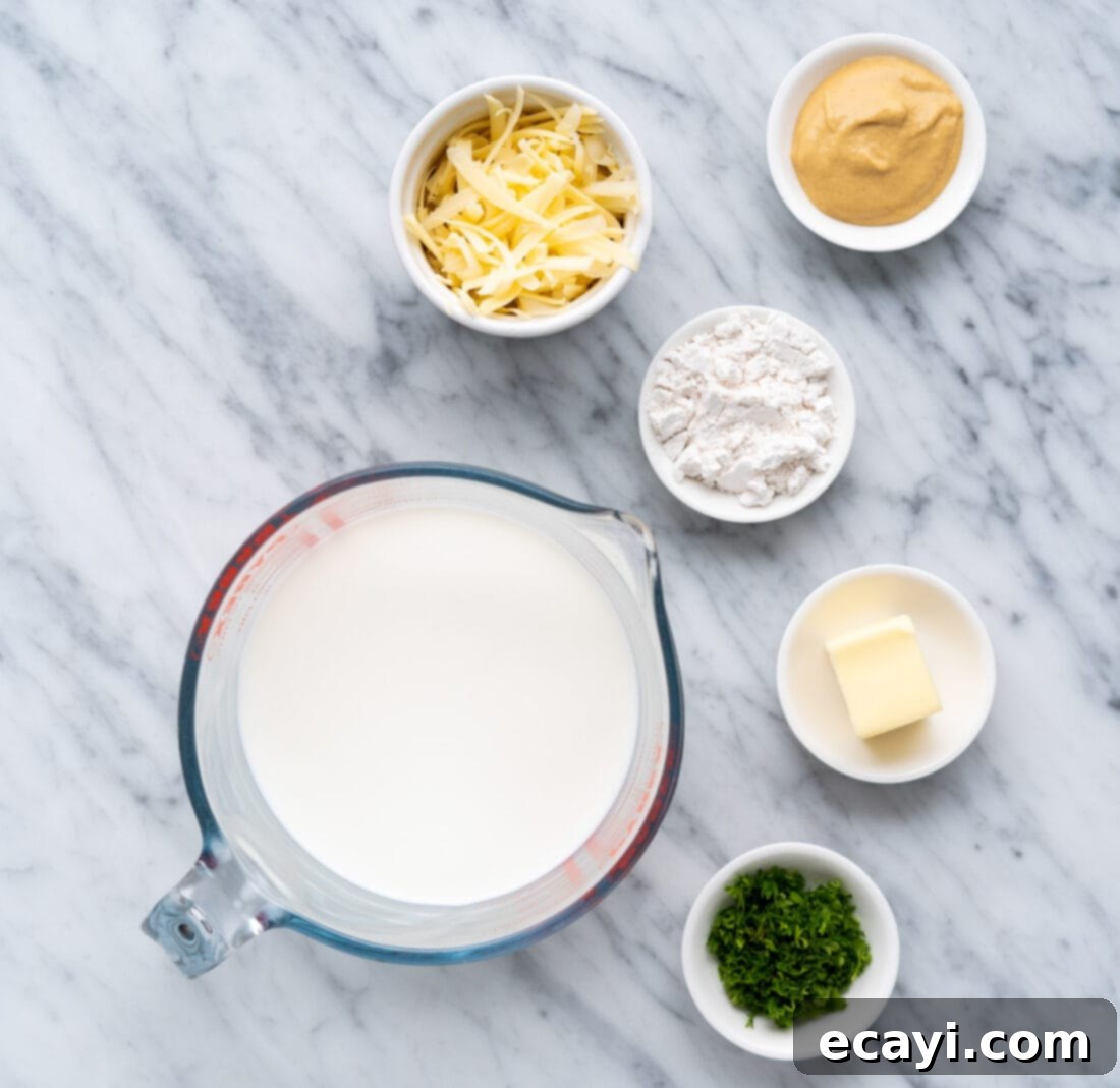 Crispy Air Fryer Chicken Cordon Bleu 5 Sauce ingredients for creamy dijon sauce: butter, milk, dijon mustard, and swiss cheese