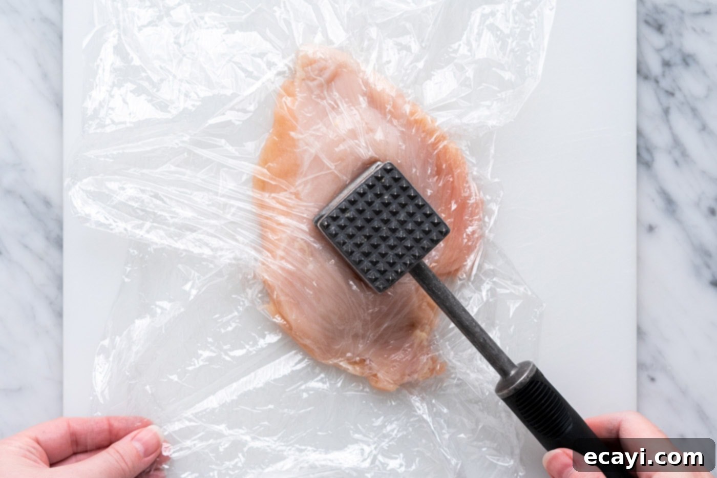 Crispy Air Fryer Chicken Cordon Bleu 6 Pounding chicken breasts thin with a meat mallet between plastic wrap