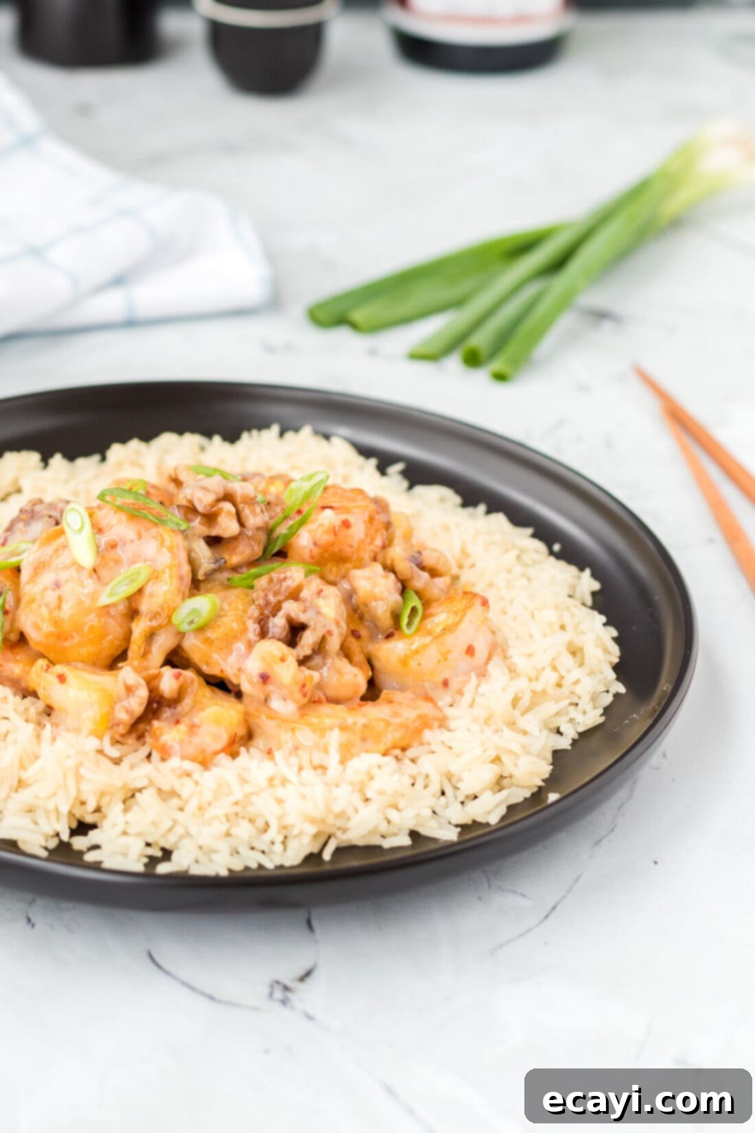 Candied Honey Walnut Shrimp 3 A plate of Honey Walnut Shrimp served with a side of white rice