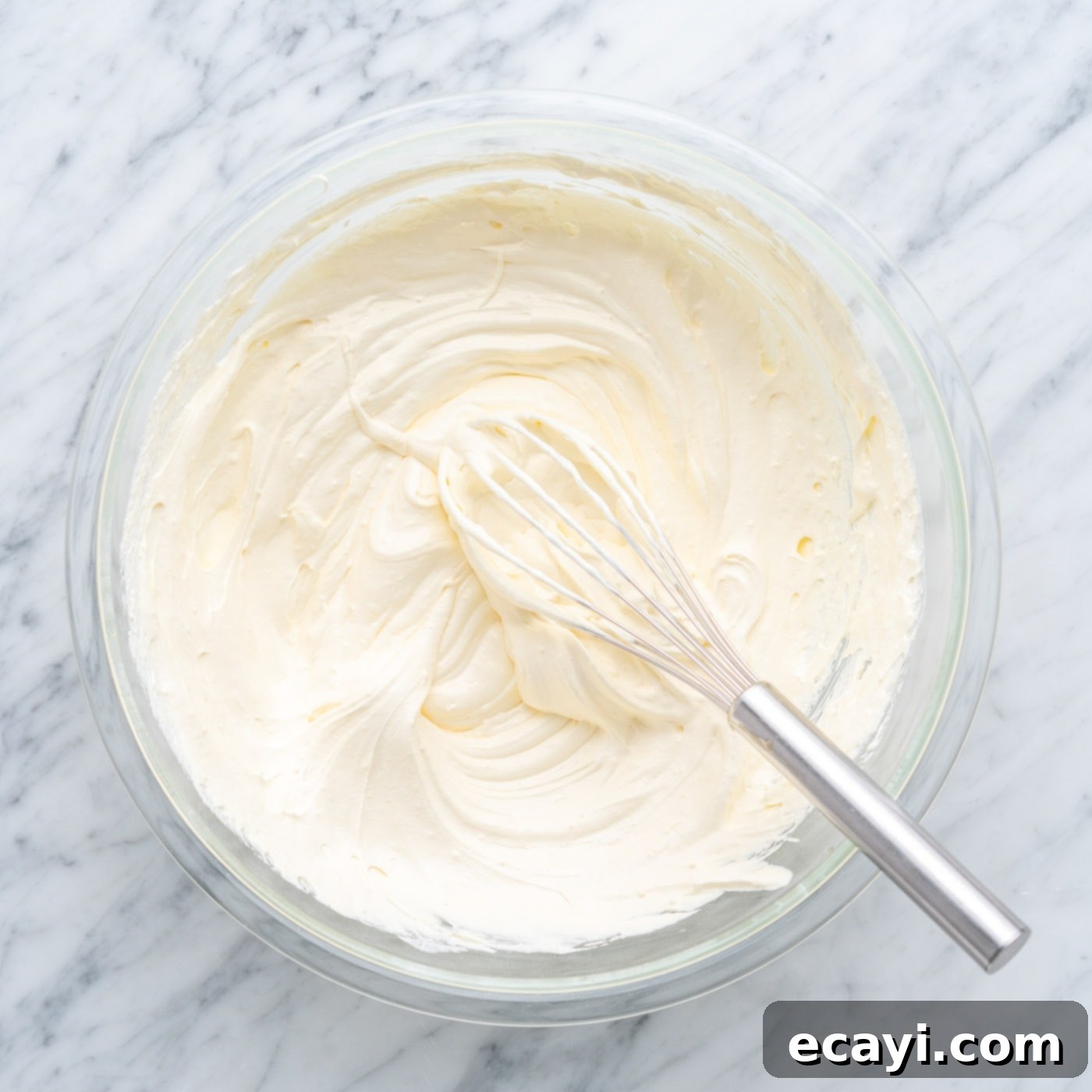 Radiant Pineapple Delight 11 Fluffy pineapple frosting whipped to perfection in a bowl