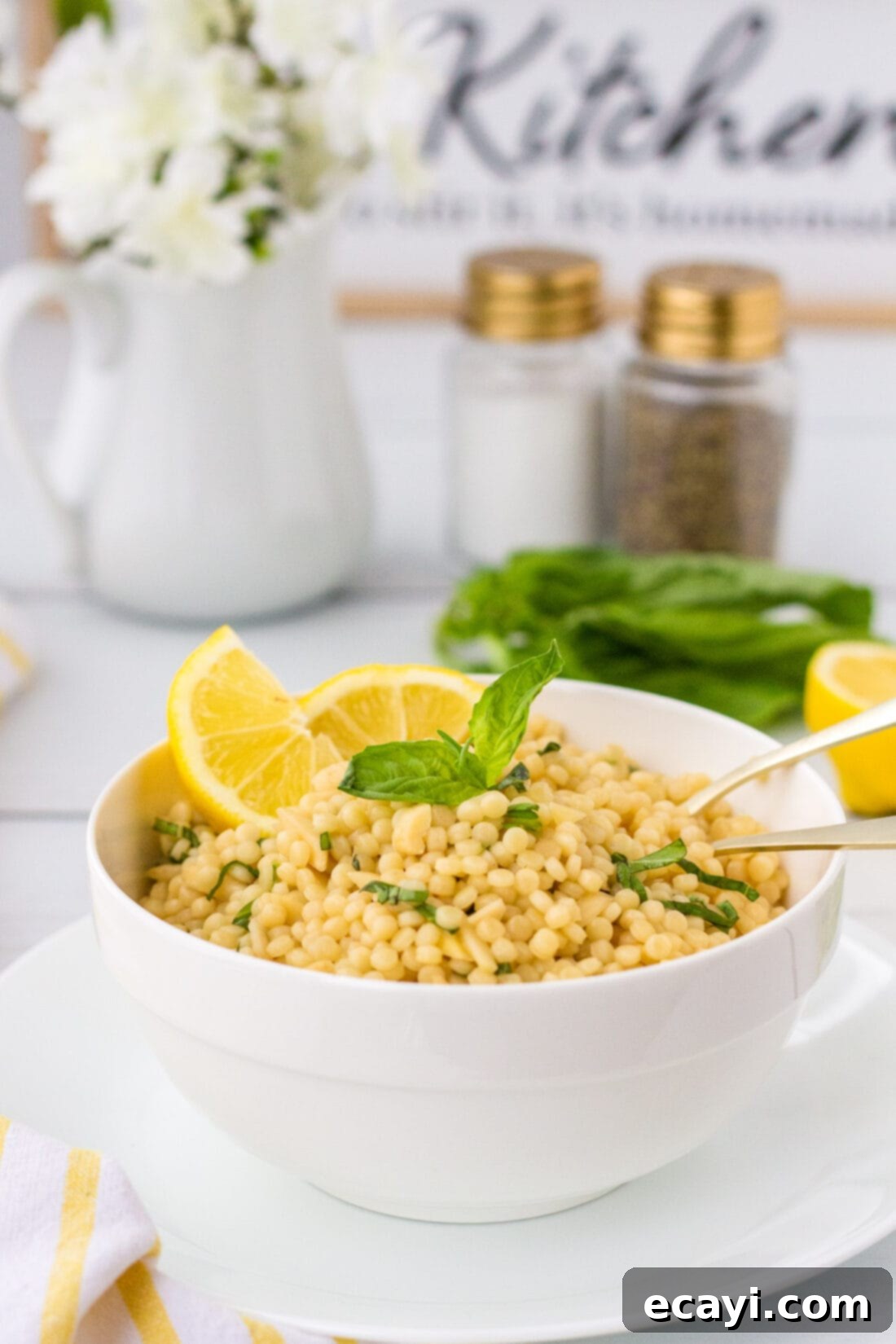 Bright Lemon Couscous 3 Lemon Couscous with salt and pepper in background, ready to be served