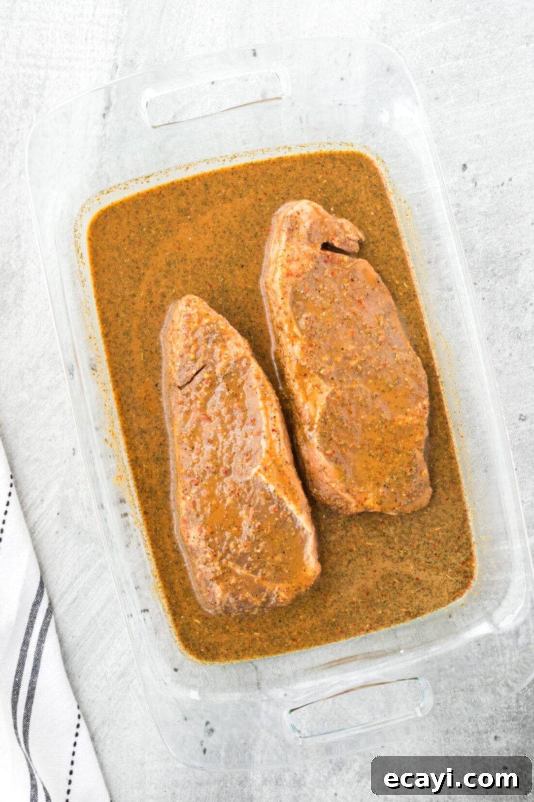 Perfect Steak Marinade 2 Steak Marinating in a pan