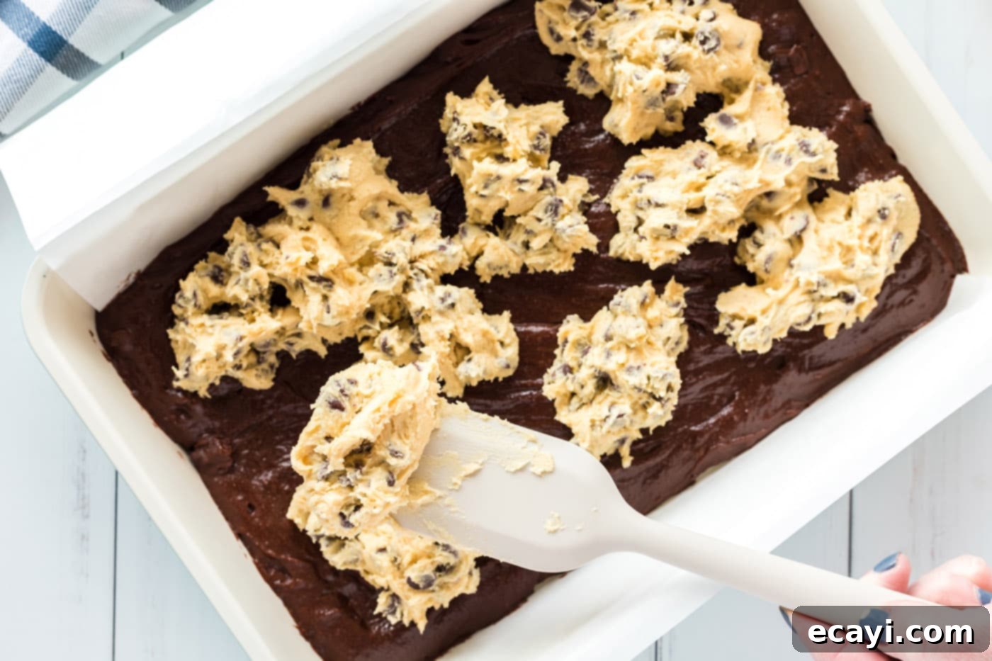 Cookie Brownie Perfection 15 spoonfuls of cookie dough strategically dropped onto the brownie batter