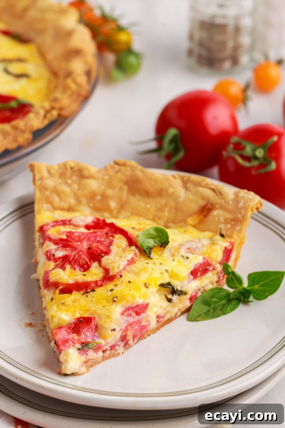 Summer Tomato Tart 14 slice of Tomato Pie on plate
