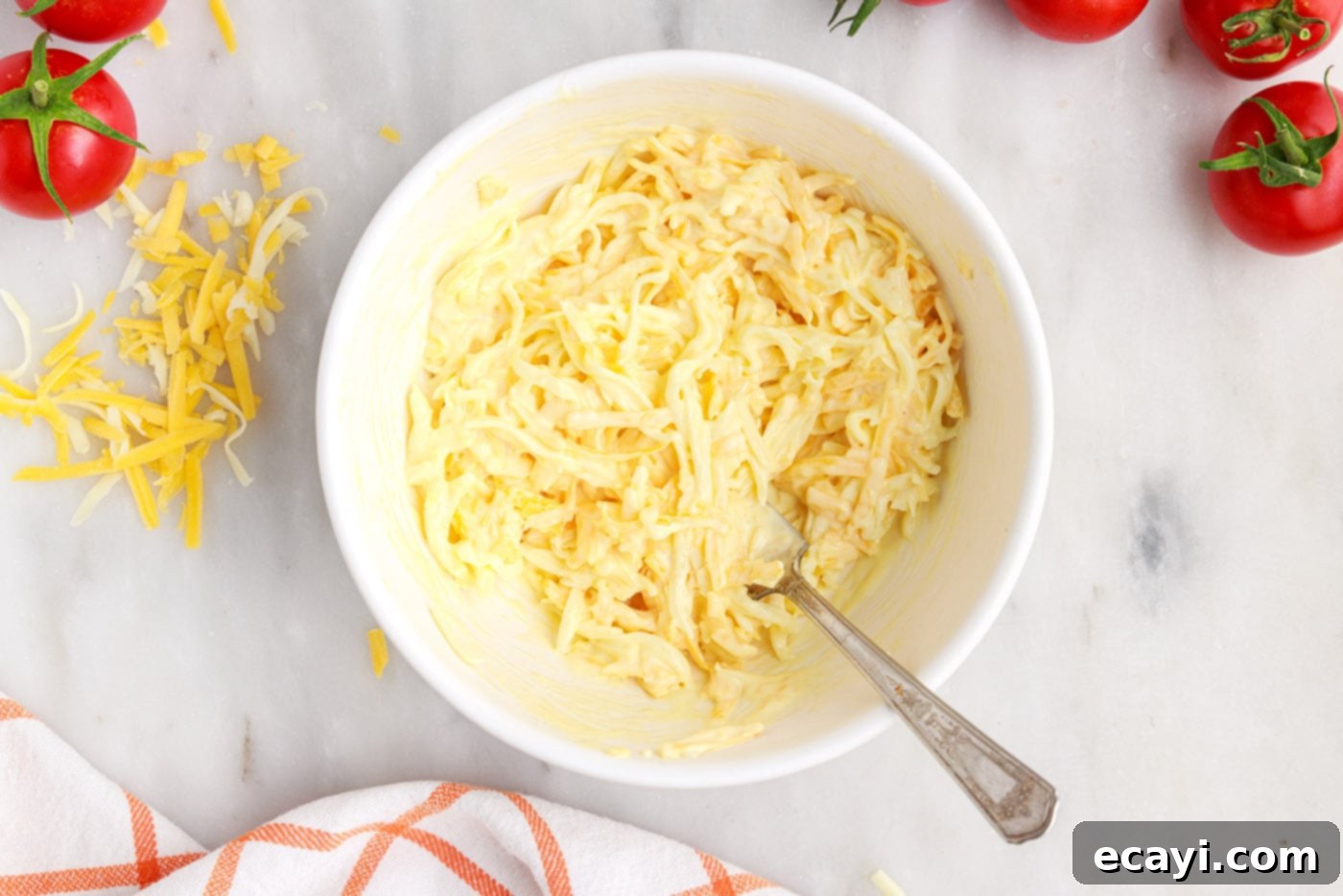 Summer Tomato Tart 10 mayo egg and cheese mixed in a bowl