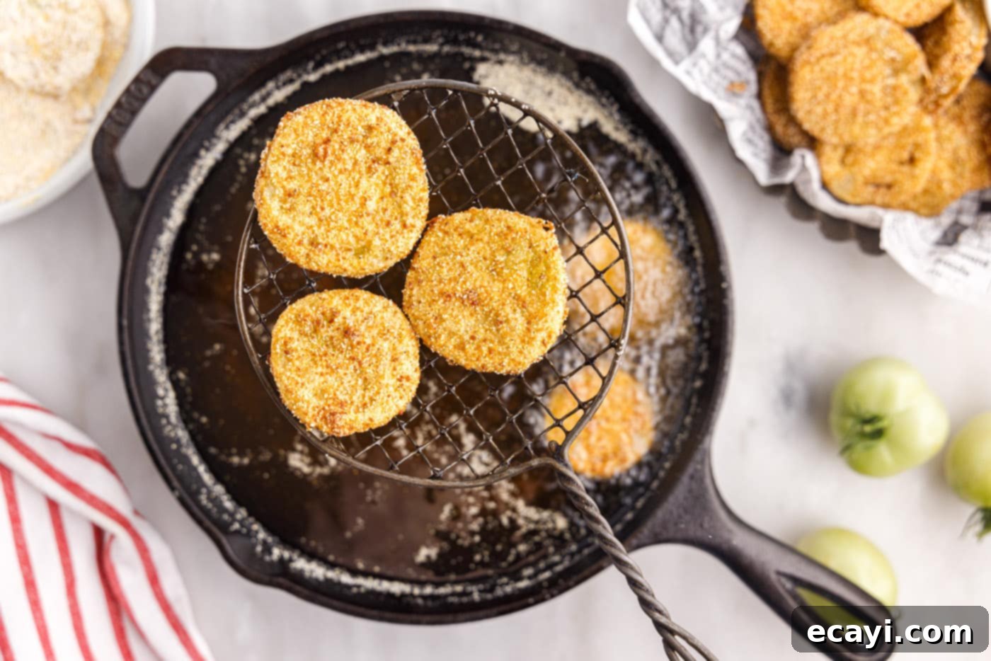 Deep Fried Truths 13 fried green tomatoes over hot oil