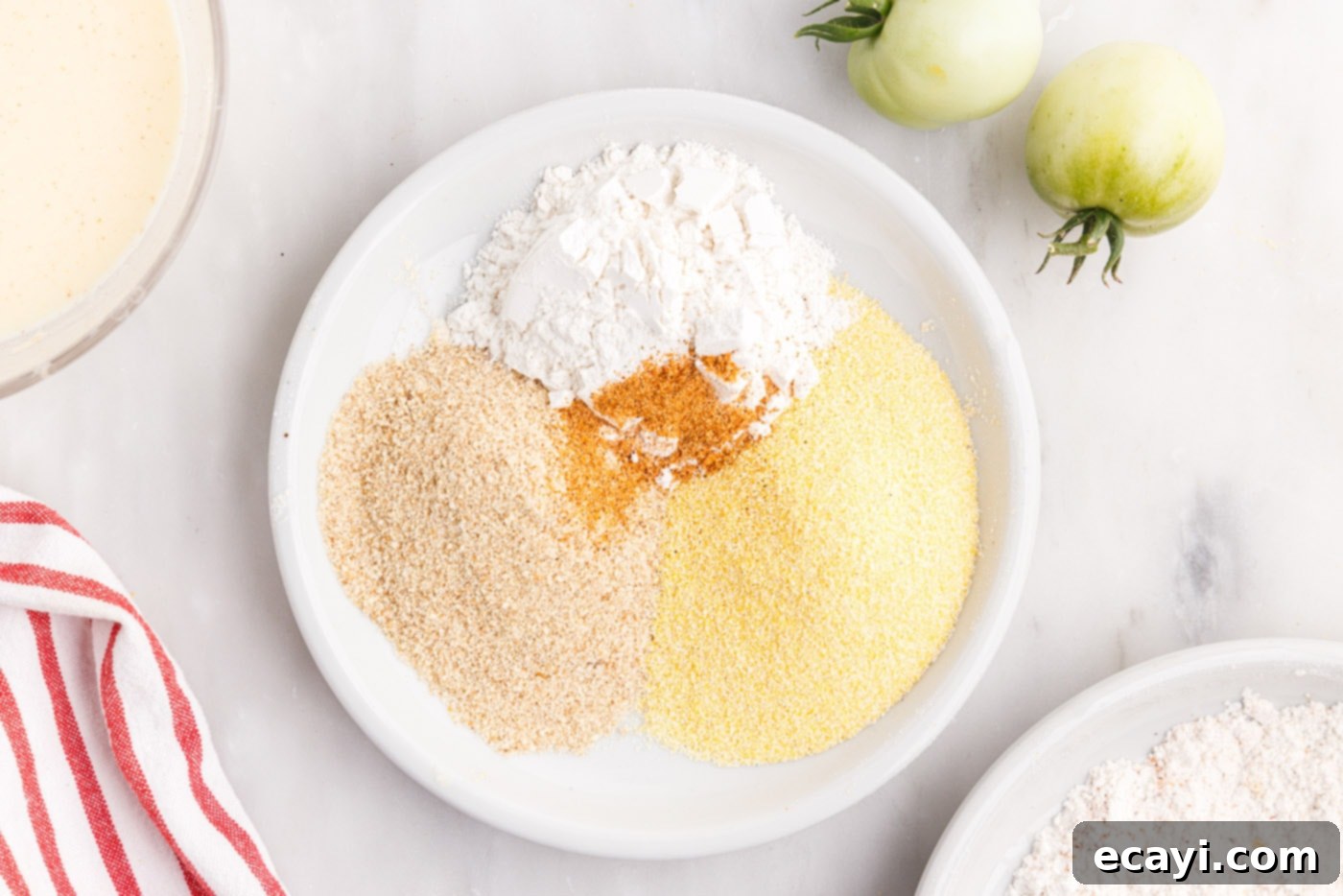 Deep Fried Truths 9 flour, cornmeal, cajun seasoning, and breadcrumbs for fried tomatoes