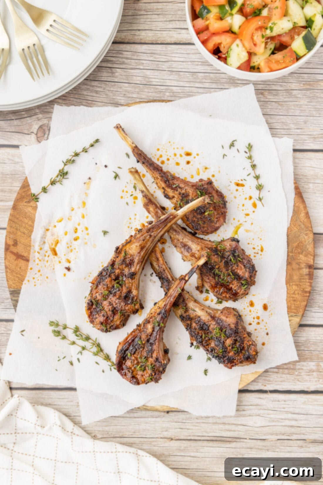 Char-Grilled Lamb Delights 2 Grilled Lamb Chops on a wood board, showcasing their beautiful sear and seasoning.
