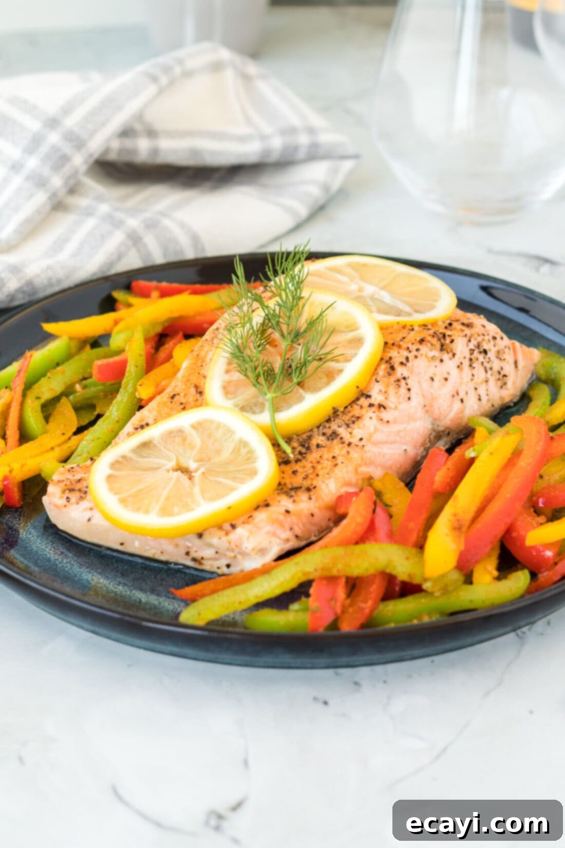 Effortless Instant Pot Salmon 3 Perfectly cooked salmon fillet on a white plate