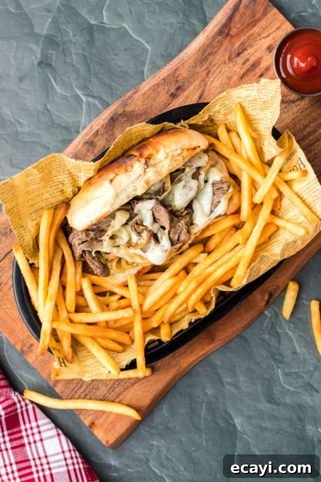 Philly's Legendary Cheesesteak 2 Philly Cheese Steak in basket with fries
