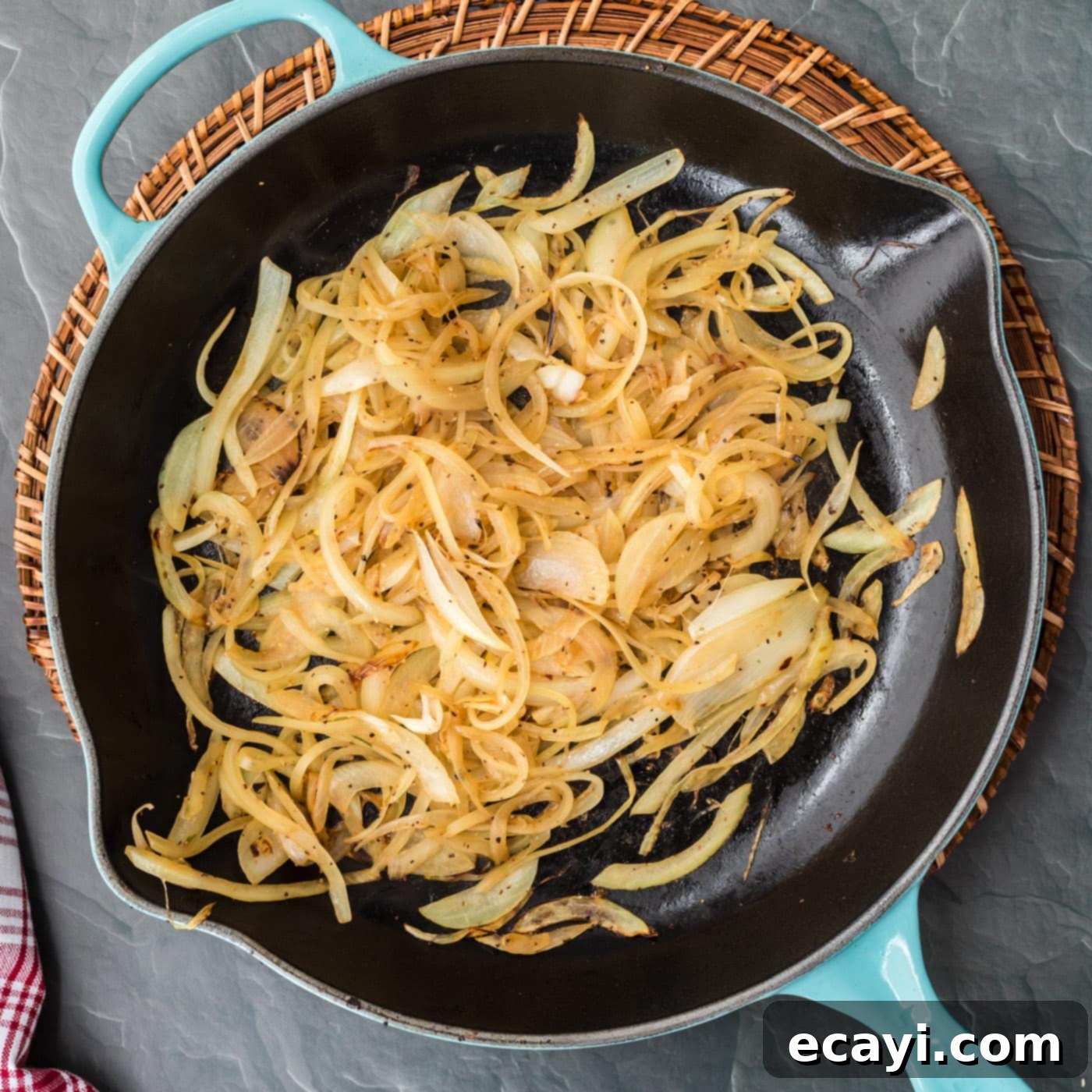 Philly's Legendary Cheesesteak 8 sauteed onions in a pan