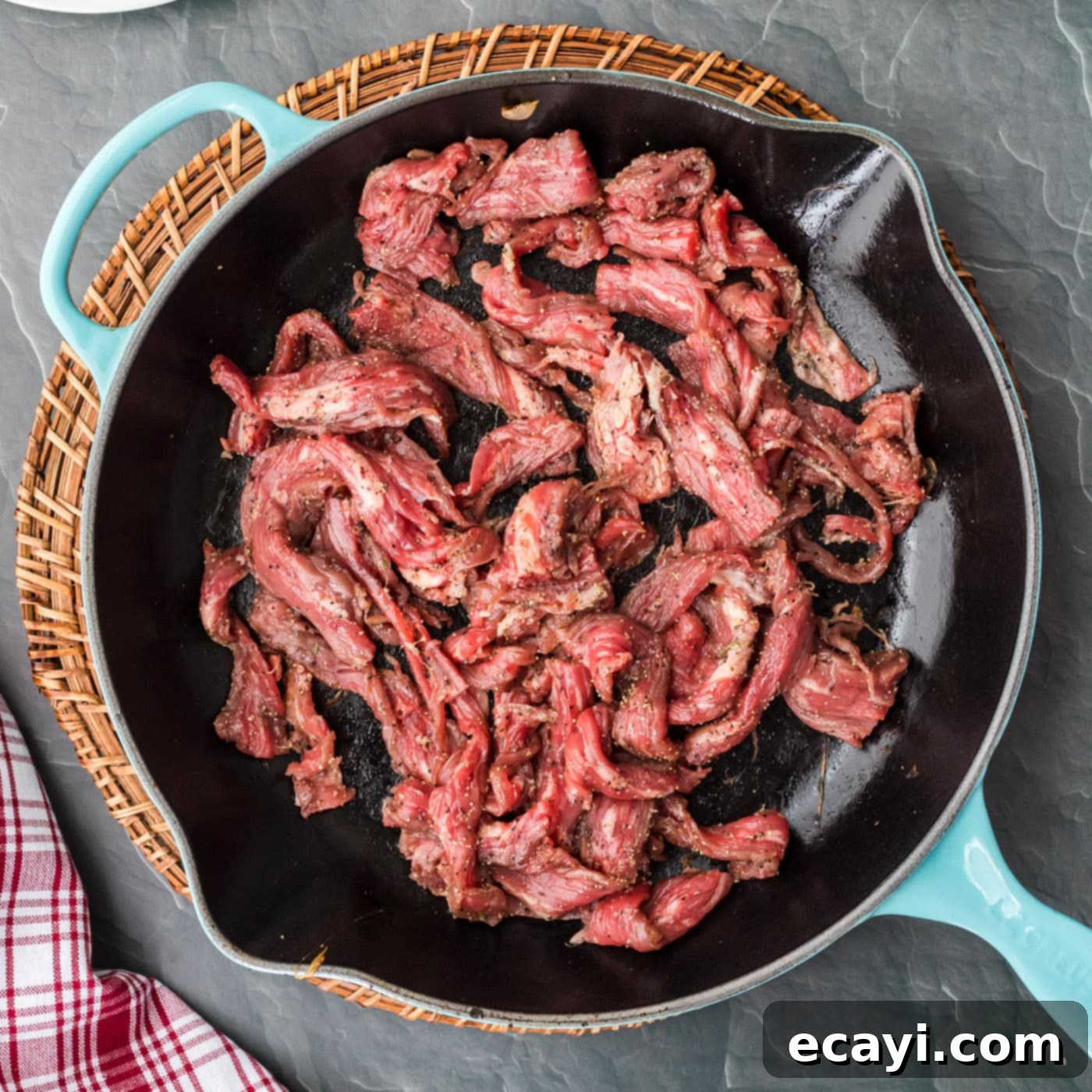 Philly's Legendary Cheesesteak 9 beef strips in a skillet