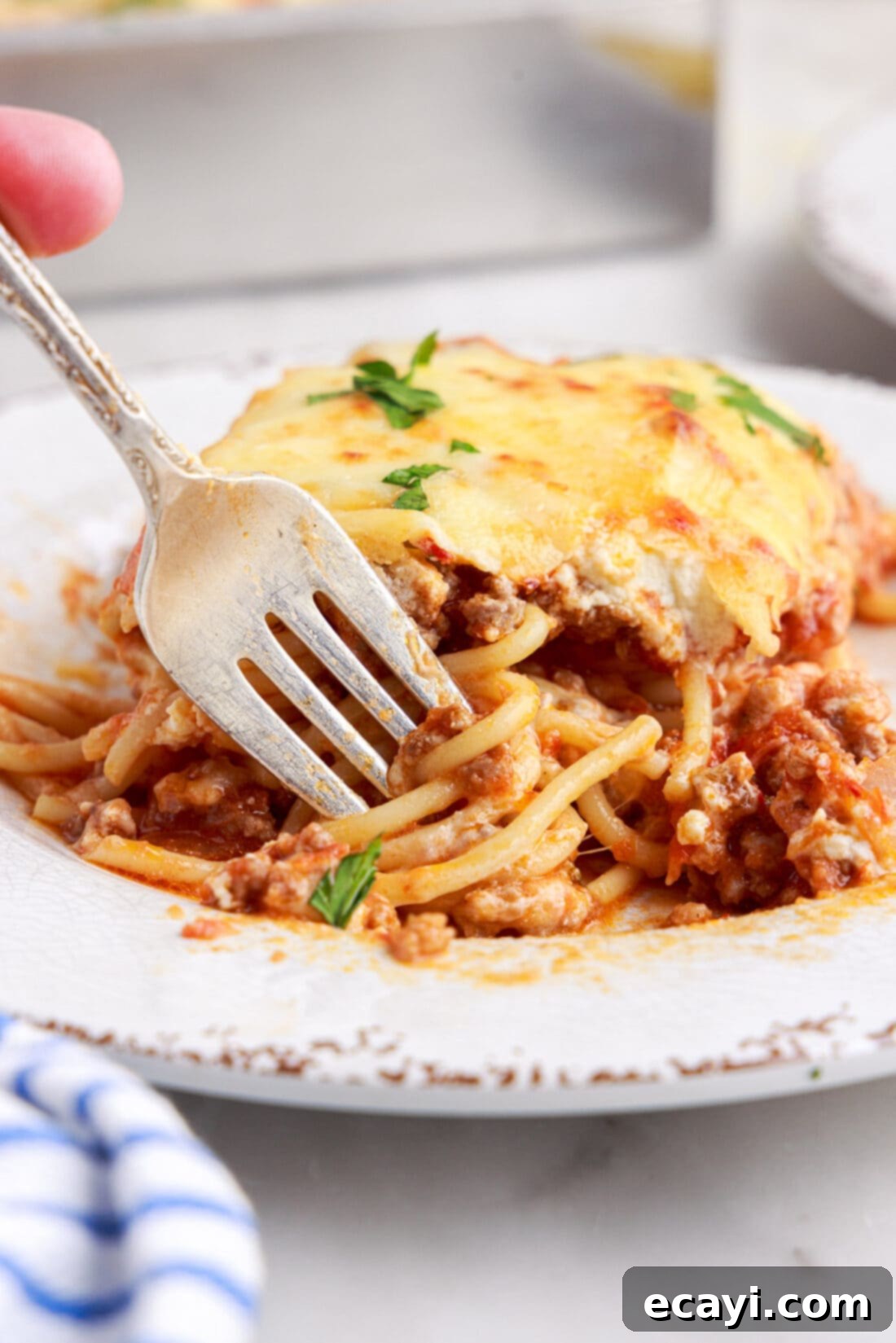 The Ultimate Million Dollar Spaghetti 3 A delicious plate of Million Dollar Spaghetti, ready to be enjoyed, showing its distinct layers.