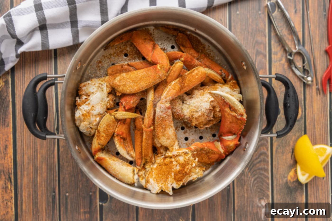 Pacific's Sweetest Catch 5 Dungeness crab legs arranged in a steamer pot, ready for cooking.
