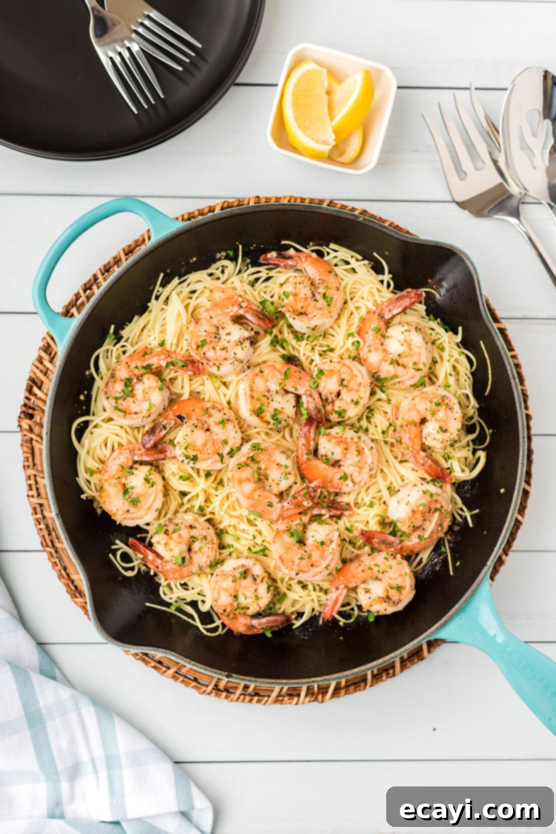 Garlic Butter Shrimp Pasta 2 Skillet of glistening Shrimp Scampi Pasta, ready to serve.