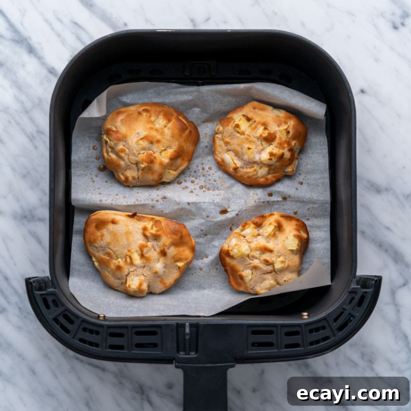 Crispy Air Fryer Apple Fritters 11 turning apple fritters over in air fryer