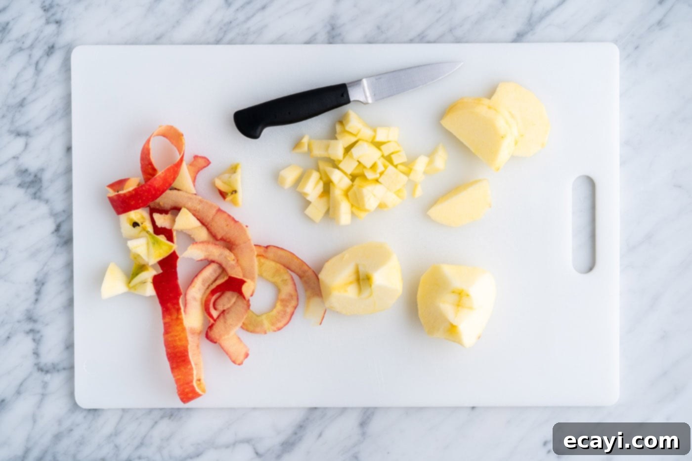 Crispy Air Fryer Apple Fritters 6 chopped apples on a cutting board