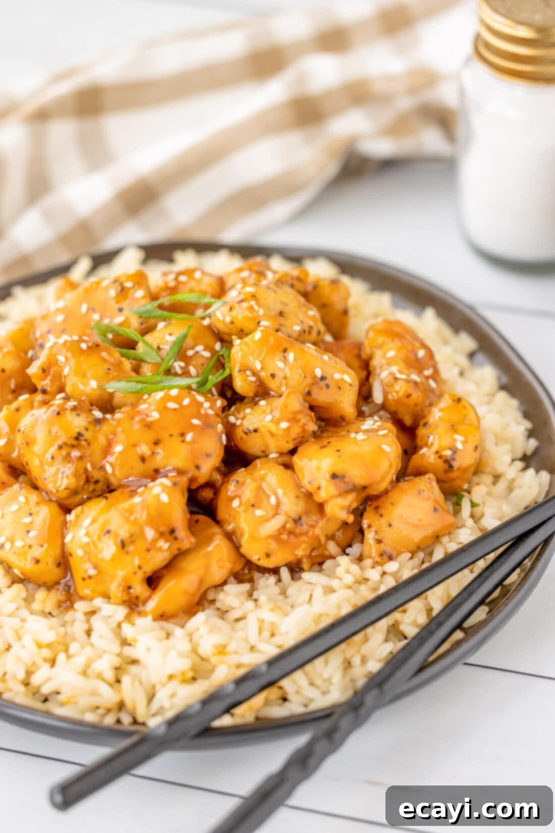Sticky Bourbon Glazed Chicken 2 plate of Bourbon Chicken on rice