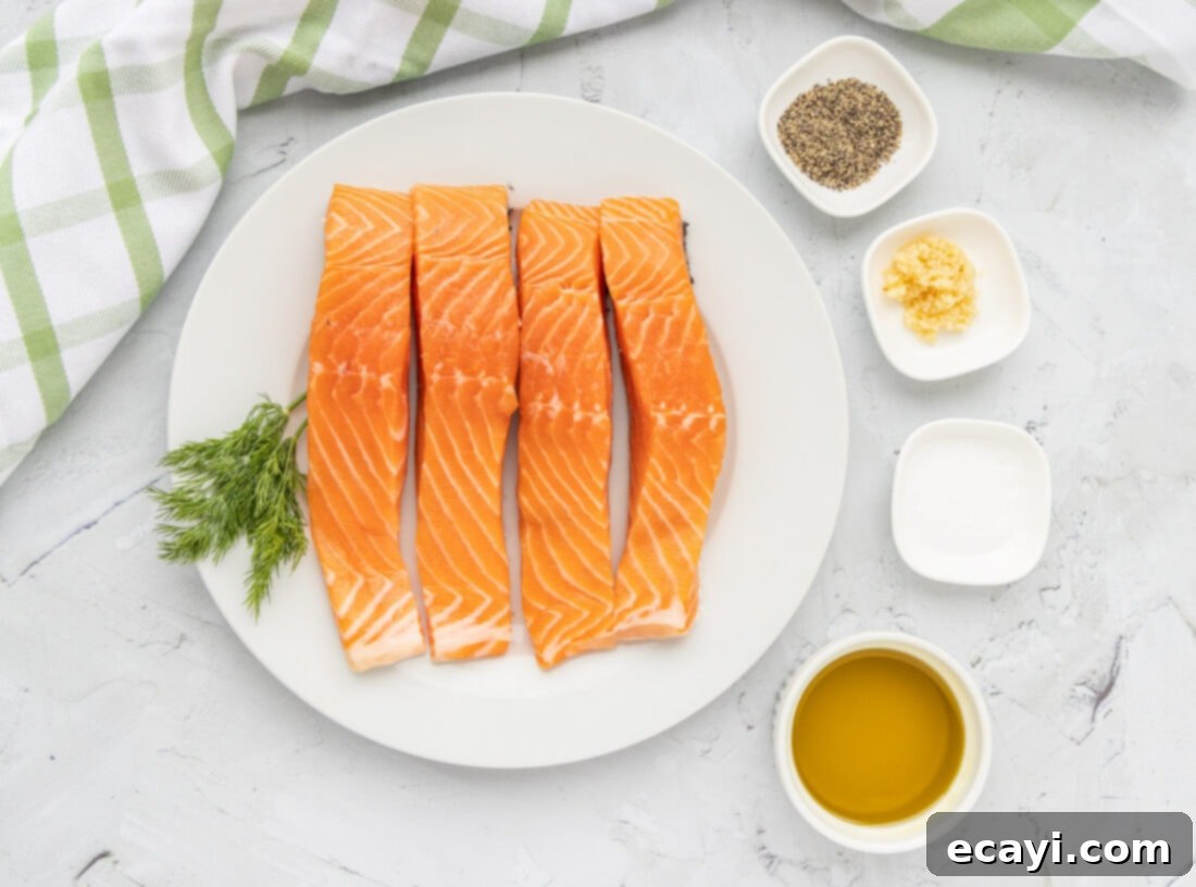 Golden Pan-Seared Salmon 4 Ingredients for Pan Seared Salmon including salmon fillets, olive oil, salt, pepper, and minced garlic