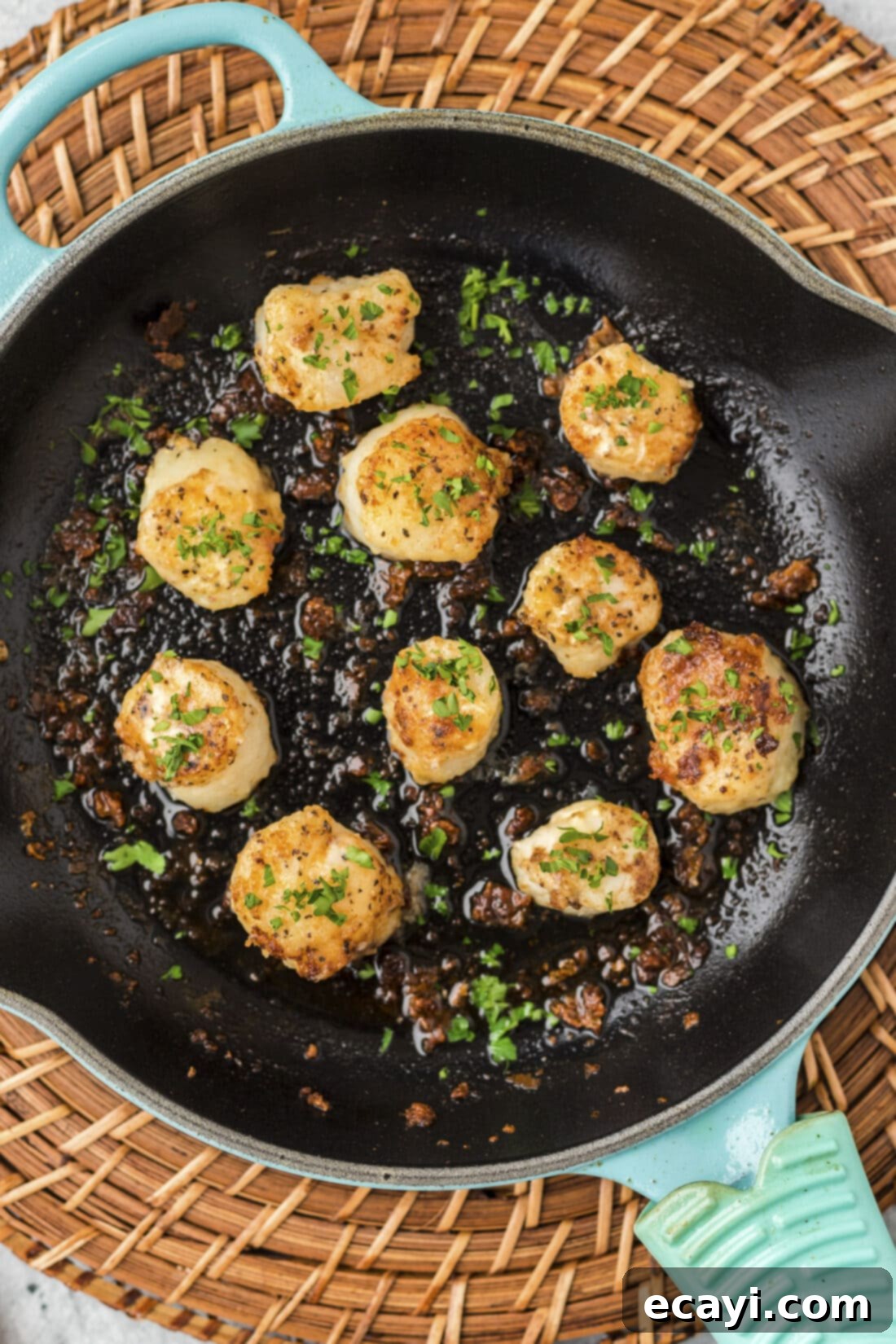 Succulent Pan Seared Scallops 3 Pan Seared Scallops in a skillet