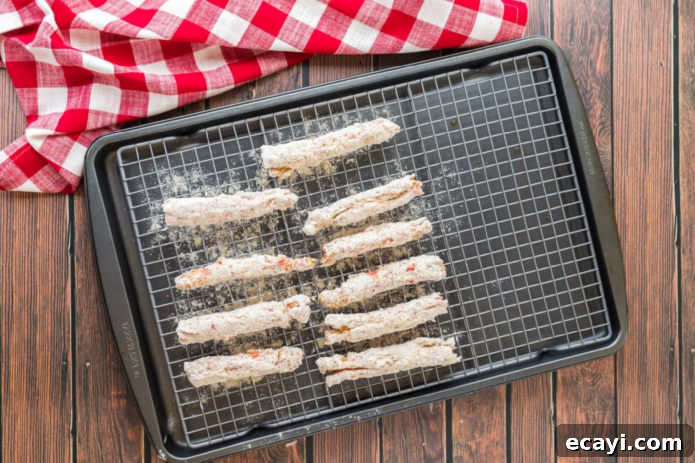 Golden Crispy Crab Legs 11 battered crab legs on a wire rack