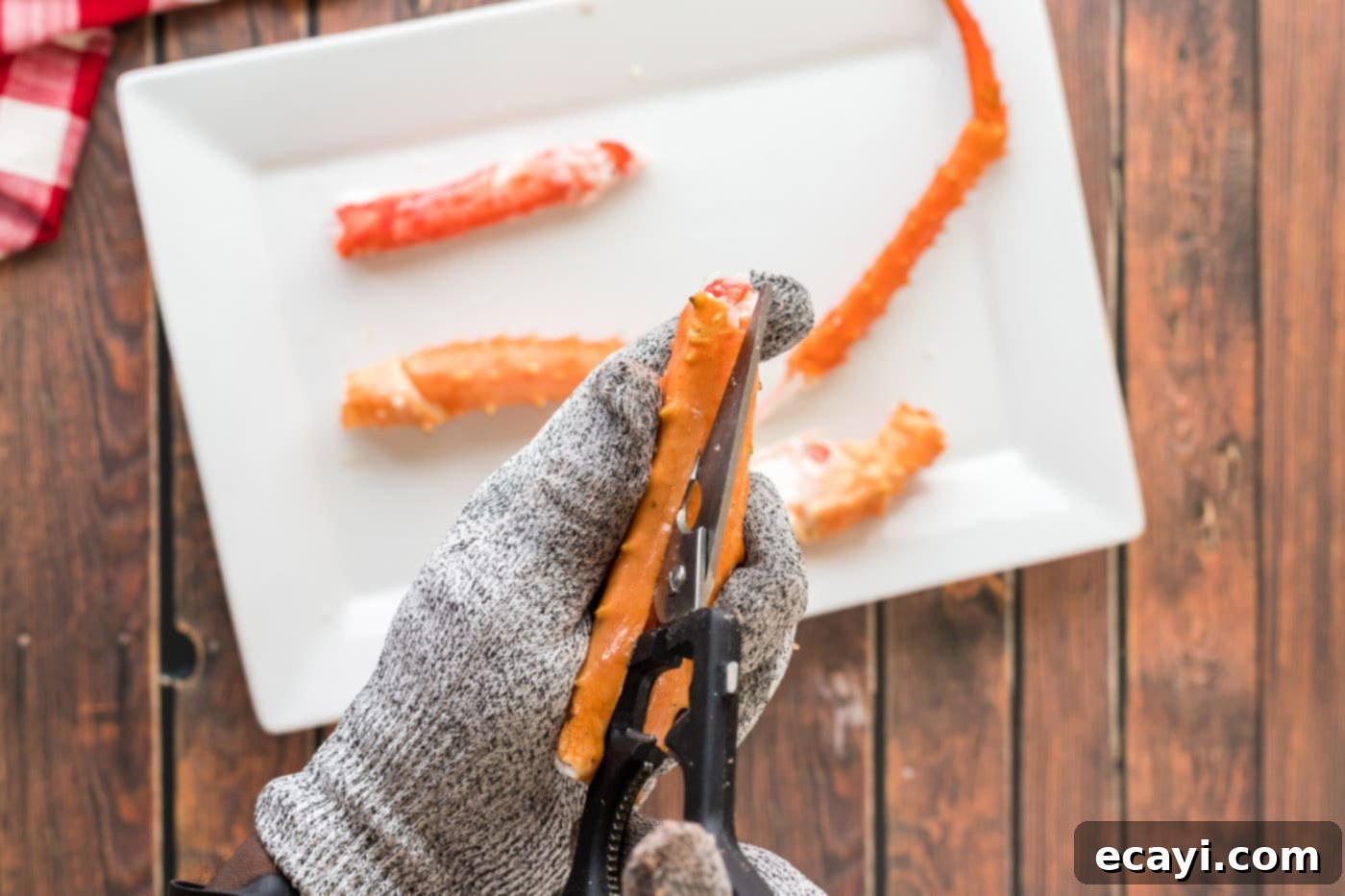 Golden Crispy Crab Legs 6 using kitchean shears to cut open crab legs