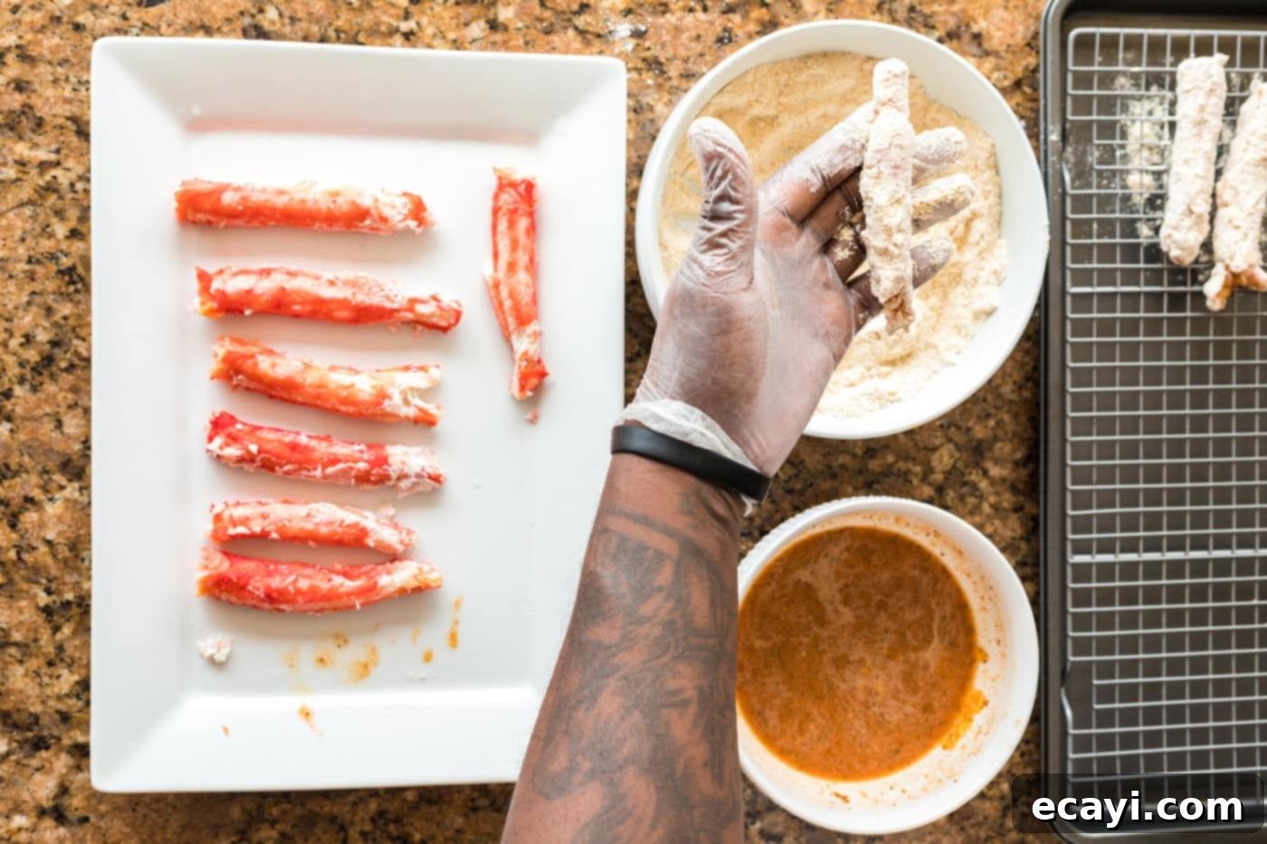 Golden Crispy Crab Legs 10 dipping crab legs into flour mixture