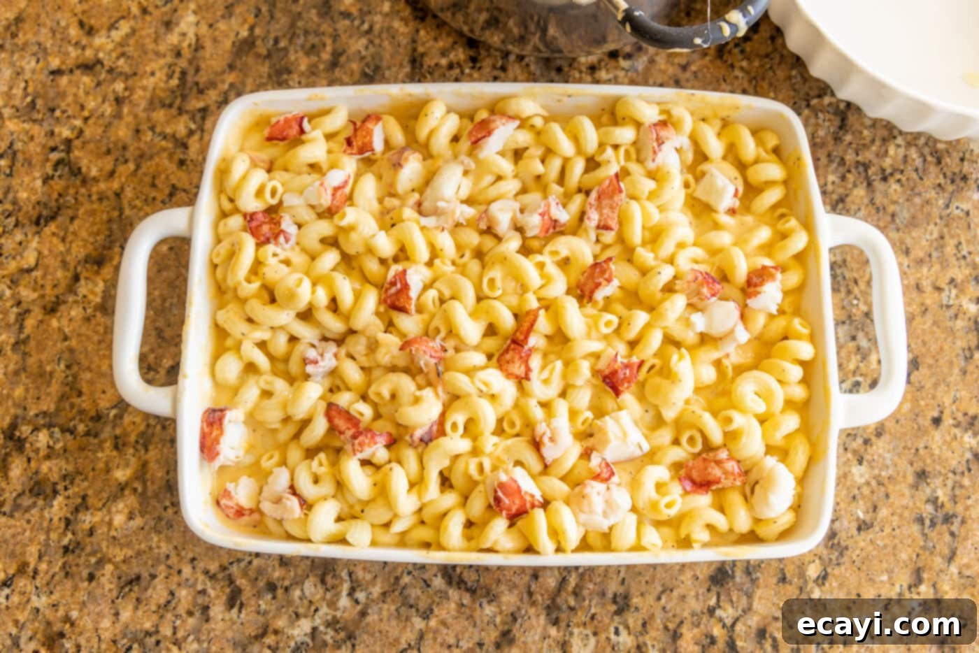 Decadent Lobster Mac and Cheese 11 lobster mac and cheese in a baking dish