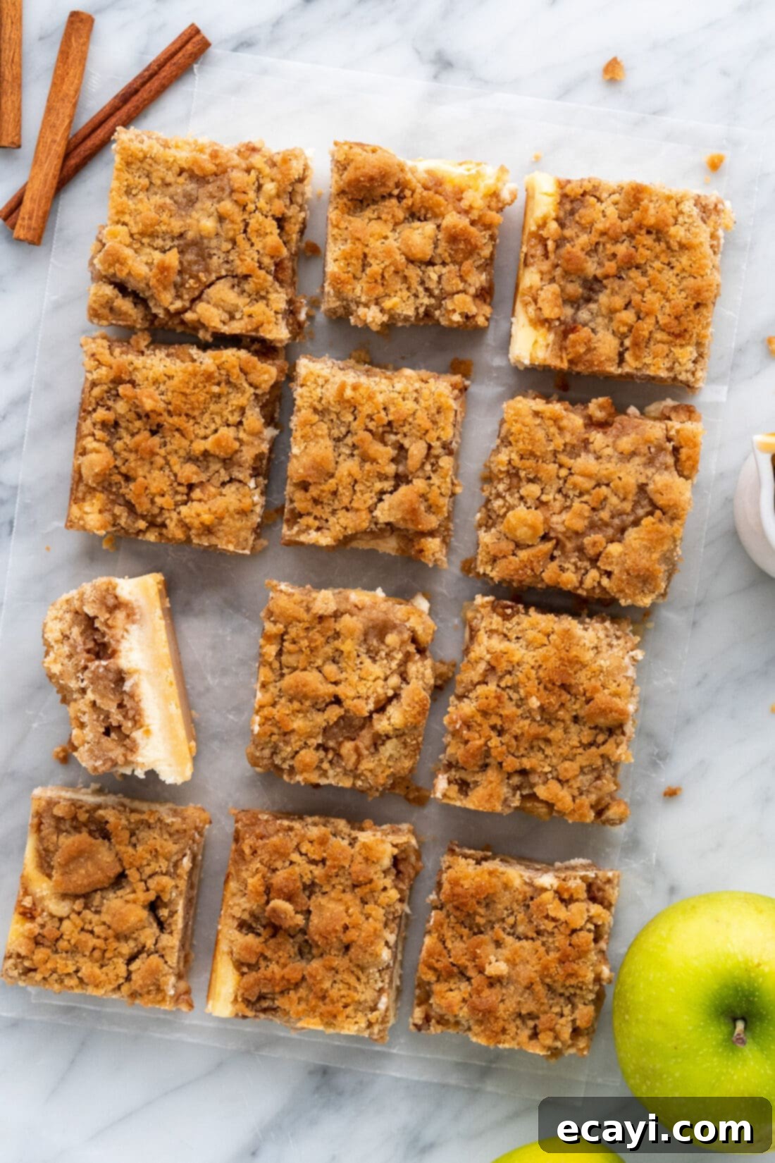 Harvest Caramel Apple Cheesecake Squares 3 Overhead shot of freshly baked Caramel Apple Cheesecake Bars ready to be sliced