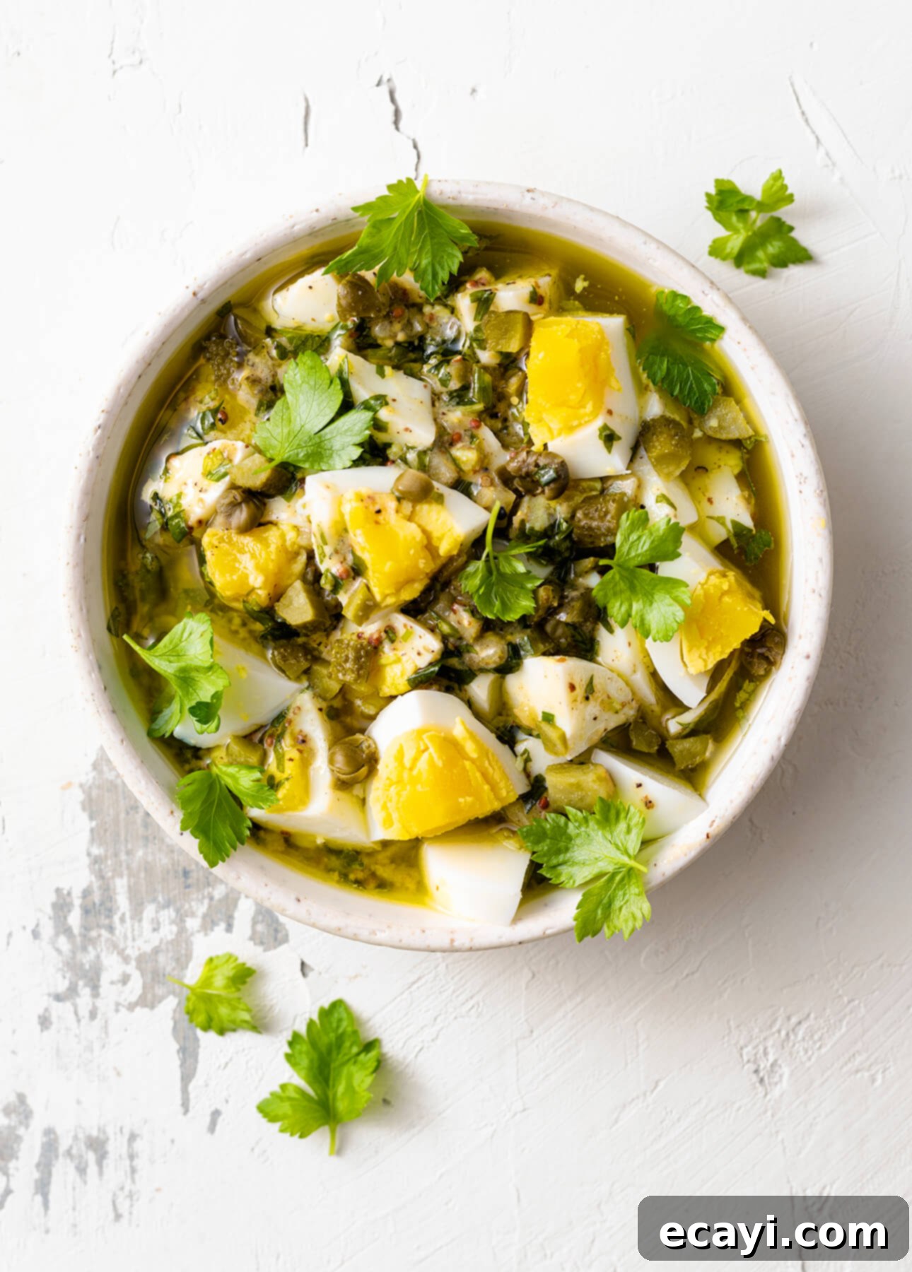 Spring Asparagus with Zesty Gribiche 4 How to make gribiche dressing: a French condiment made with hard-boiled eggs // FoodNouveau.com