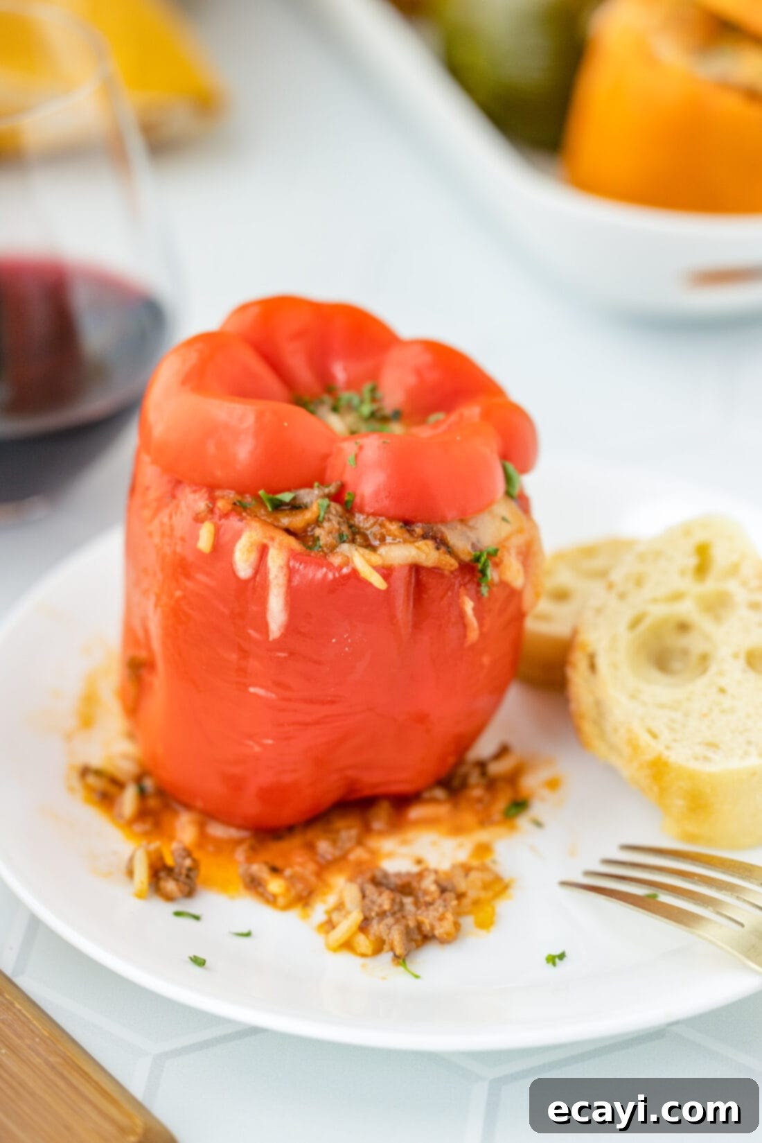 Hearty Stuffed Bell Pepper Bake 3 A single stuffed bell pepper with its top on, showing the vibrant color and the perfectly baked exterior, ready to be served.